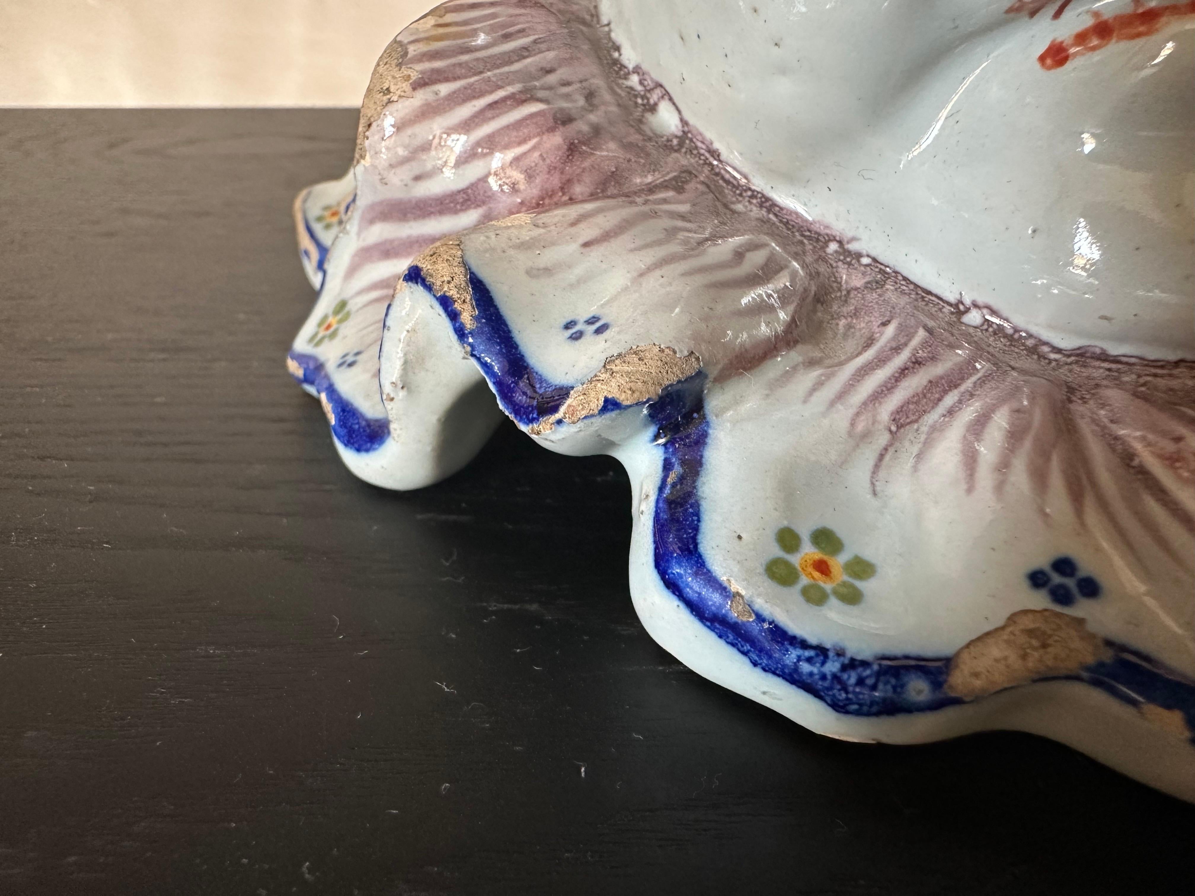 Vernissé Cache pot d'arlequin en faïence française du 19e siècle, expression double face de Rouen en vente