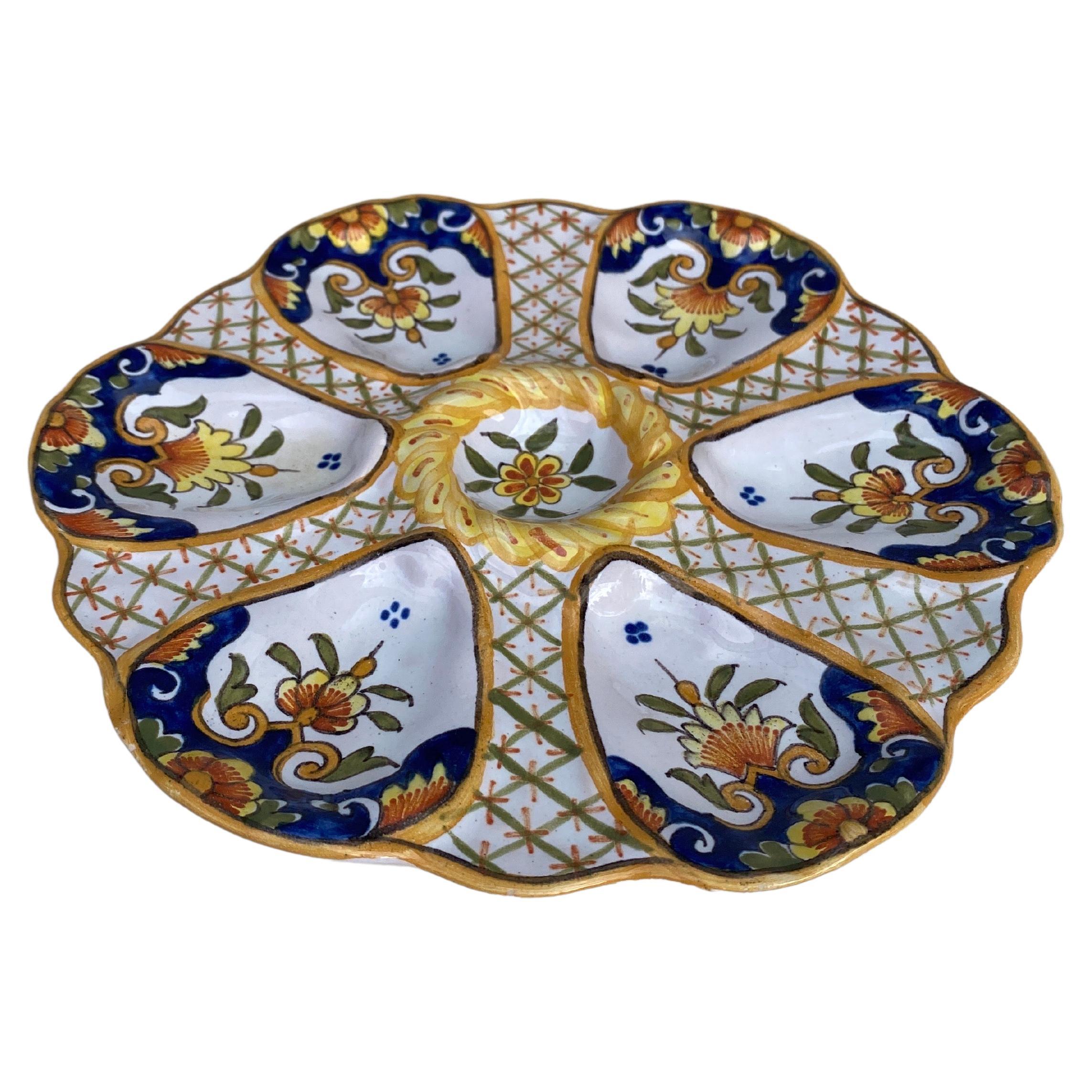 19th Century French Faience Oyster Plate.
Decorated with flowers , marked Bordeaux.