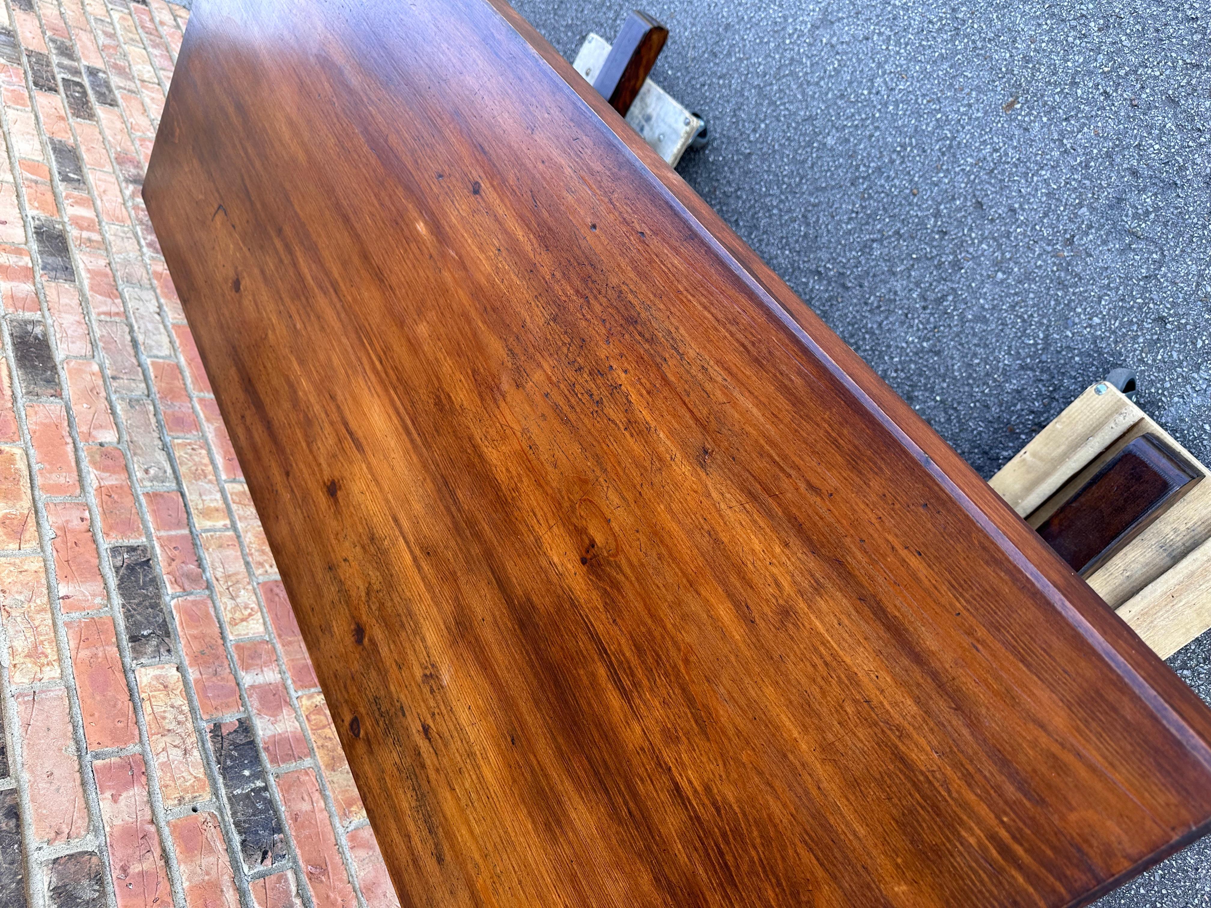 This is a stunning French farm table! Simple clean lines and a smooth top that radiate a homey elegance. The patina on this piece is beautiful, and shows up the detail in the wood especially well. This would be a wonderful addition to a dining room