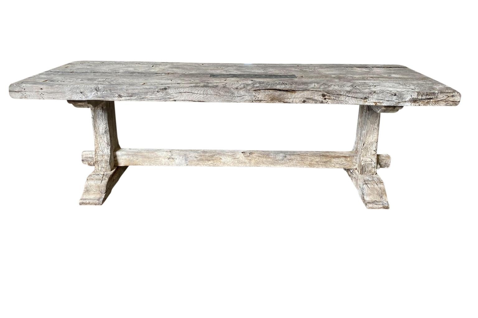 A very wonderful later 19th century farm table - trestle table from the Provence region of France. Soundly constructed from naturally washed oak. Stunning patina.