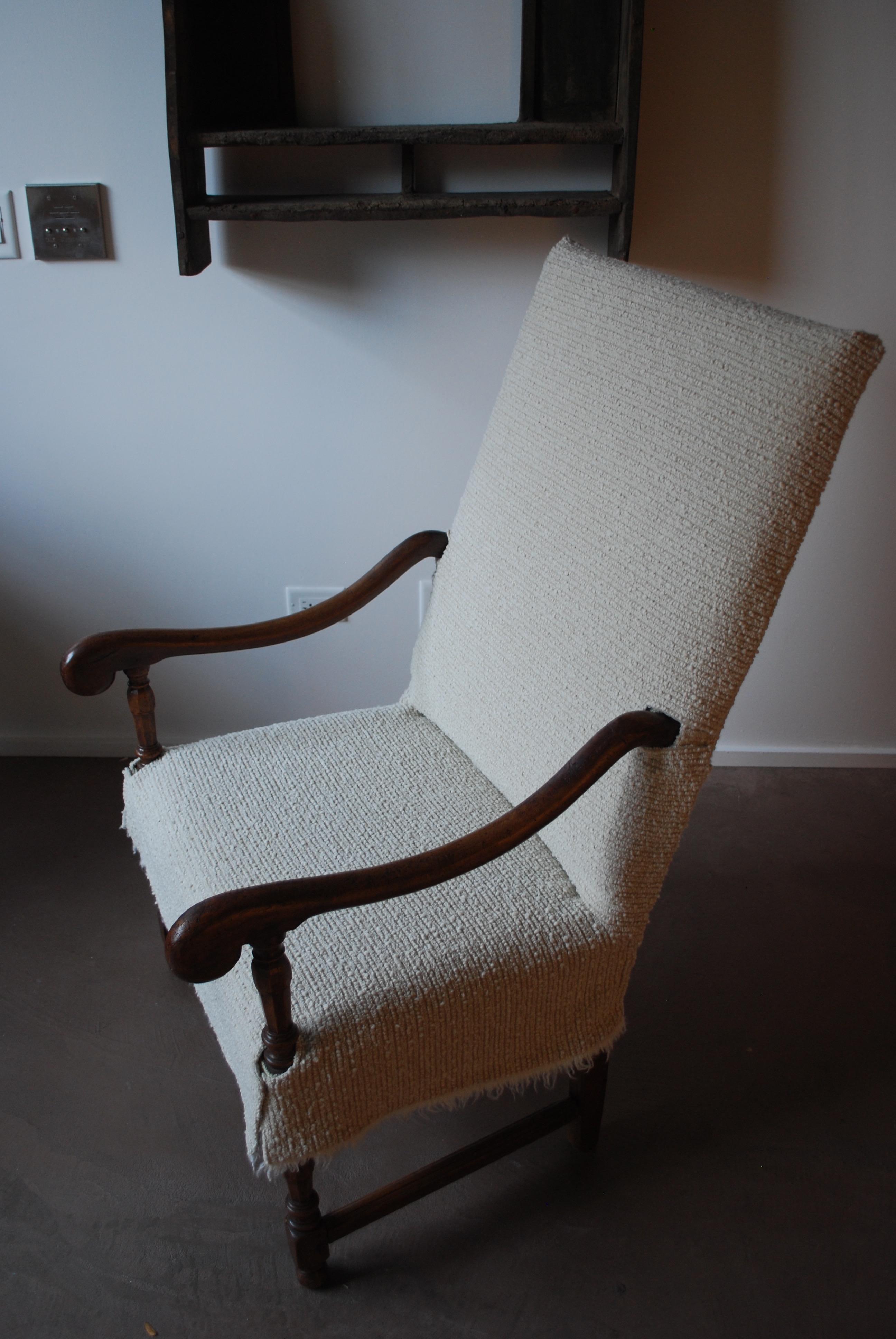 19th century French walnut Fauteuil armchair 
Upholstered in textured linen and slip covered in heavily textural wool.