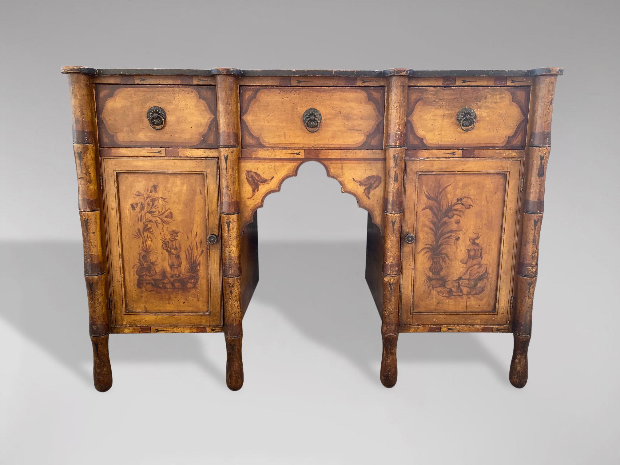 A rare late 19th century French faux bamboo dresser with original paint and drawings. This 19th century French dresser or sideboard featuring a faux bamboo frame. Rectangular shaped top above three fine dovetailed drawers accented by carved brass