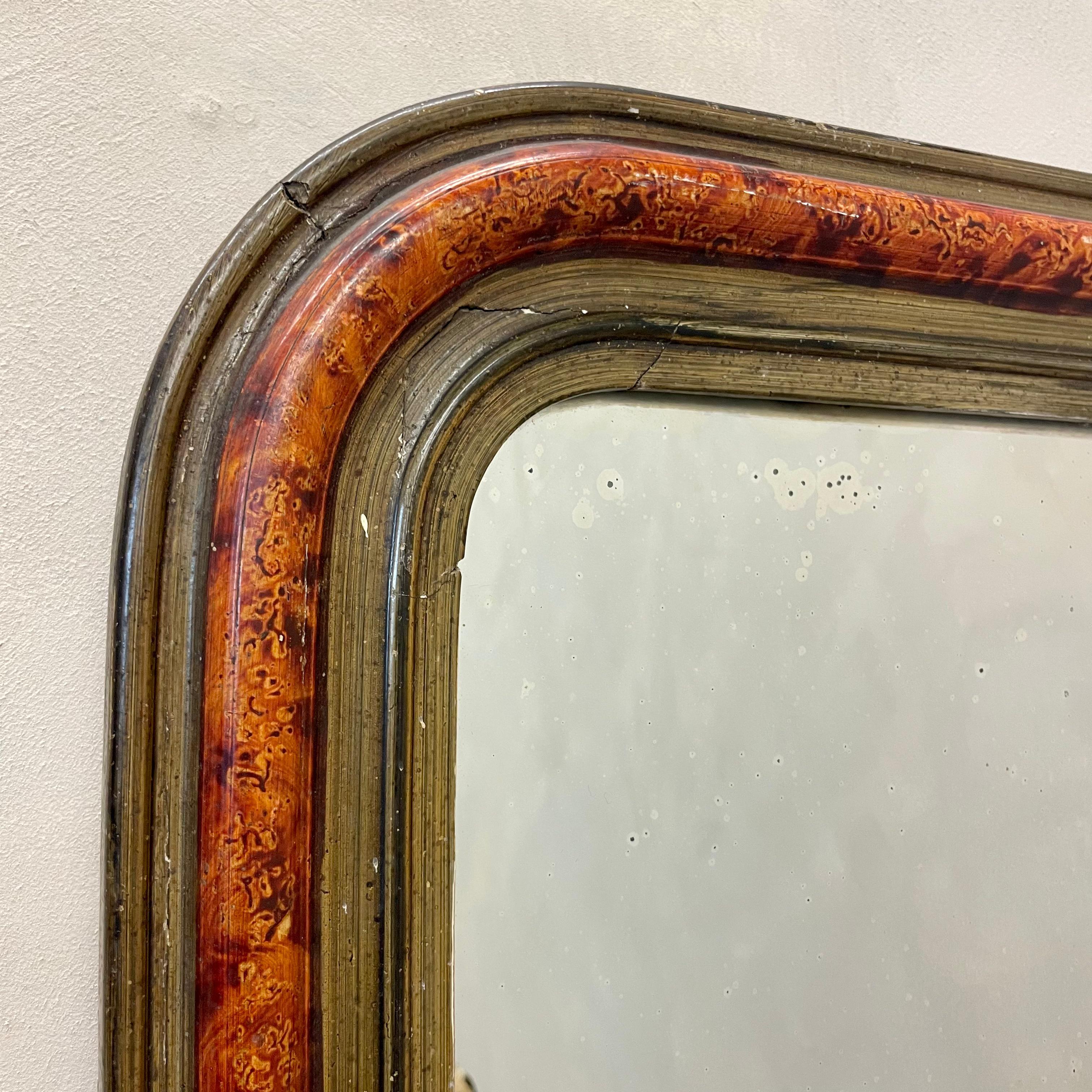 French 19th C Louis Philippe mirror.
Hand painted faux marbled paint finish.

Original mirror plate.

Dimensions:W: 42cm (16.5
