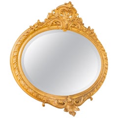 Miroir de manteau ovale français du 19ème siècle de style Louis XV