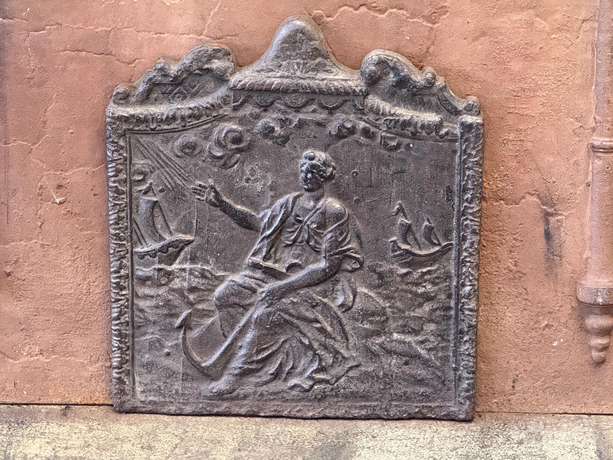 19th Century French Napoleon III Period fireback with an allegory of Navigation. 

The fireback is made of cast iron and has a natural brown patina. Upon request, it can be made black/pewter. The fireback is in good condition and does not have