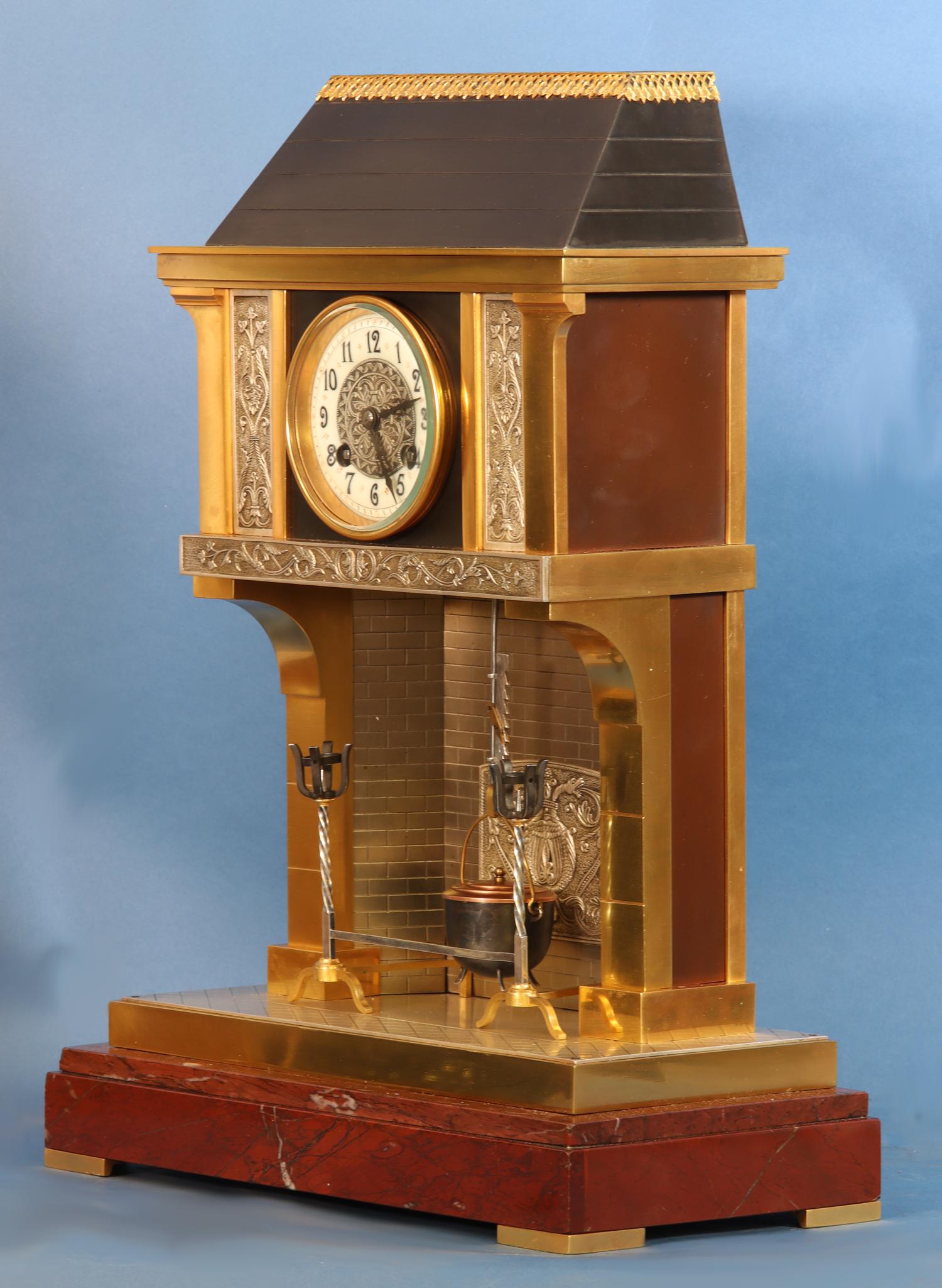 Maker:	
GLT

Description:	
A late 19th century French multi-finish fireplace clock that utilizes the swinging pot as the pendulum.

Case:	
The multi-finish gilt-bronze case depicts a French chateau’s fire place with cast decorative plaques,