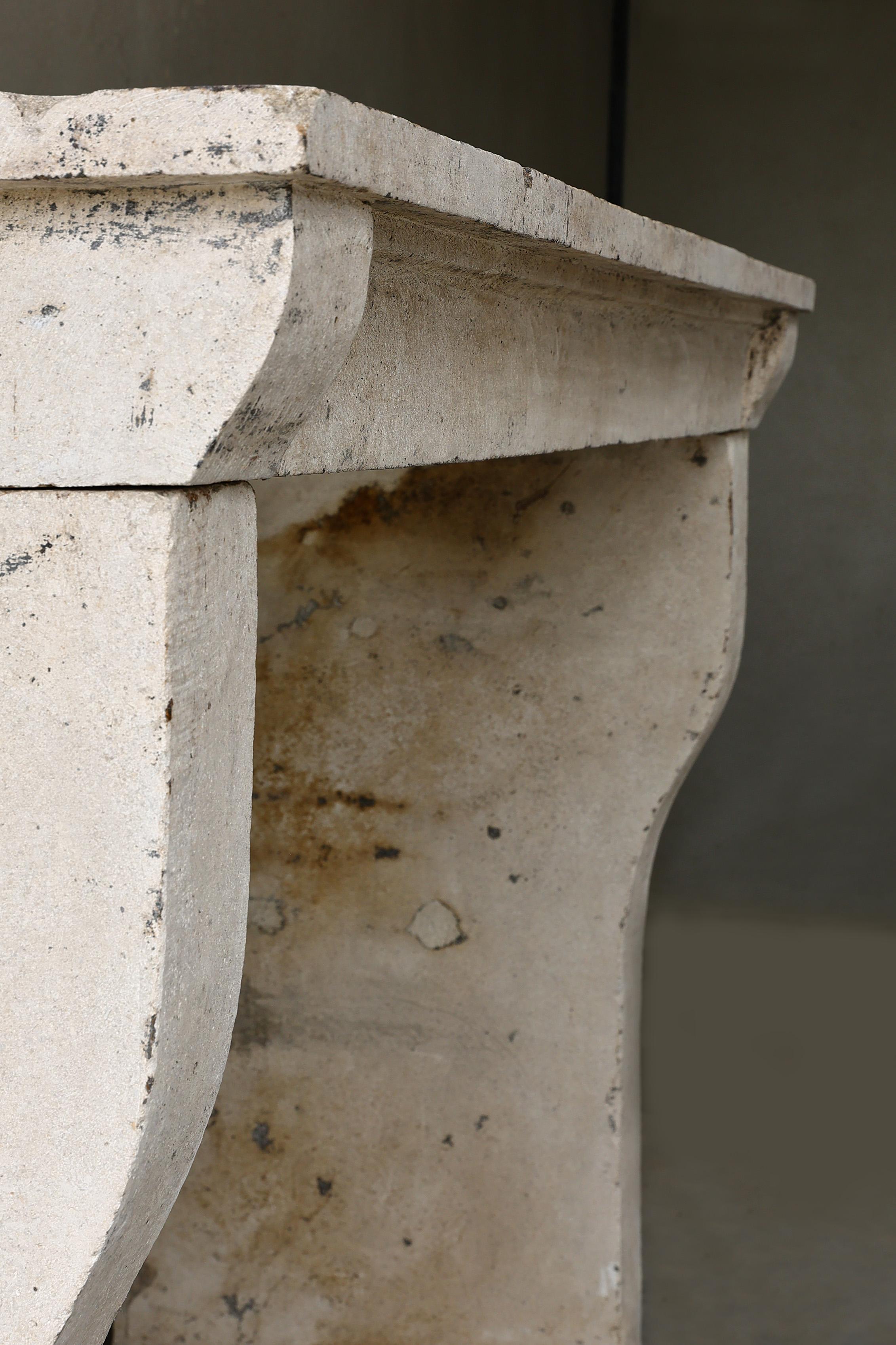 19th century French fireplace of limestone in a simple style 6