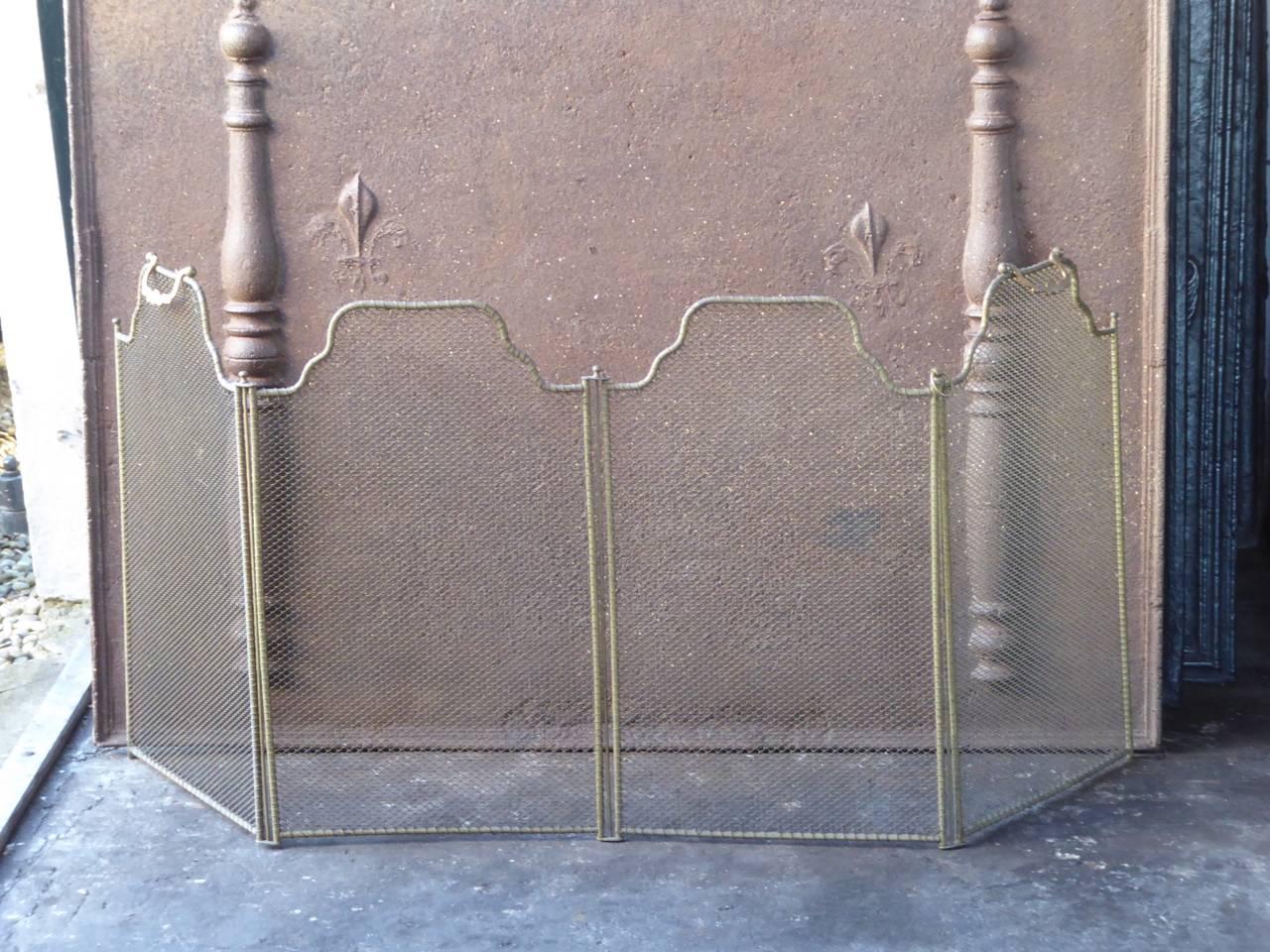 19th century French fireplace screen made of brass, iron mesh and iron.

We have a unique and specialized collection of antique and used fireplace accessories consisting of more than 1000 listings at 1stdibs. Amongst others, we always have 300+