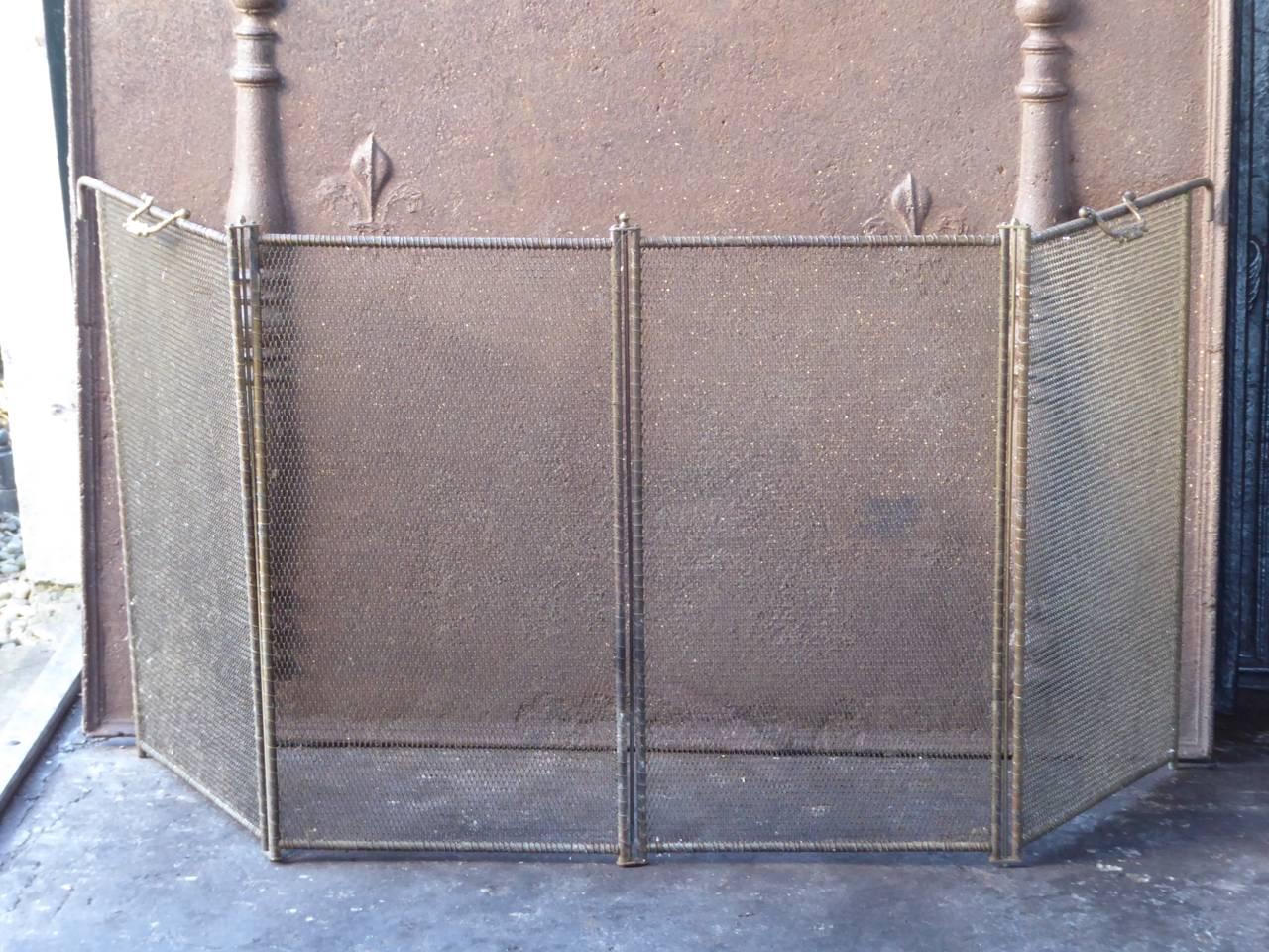 19th century French fireplace screen made of brass, iron mesh and iron.

We have a unique and specialized collection of antique and used fireplace accessories consisting of more than 1000 listings at 1stdibs. Amongst others, we always have 300+