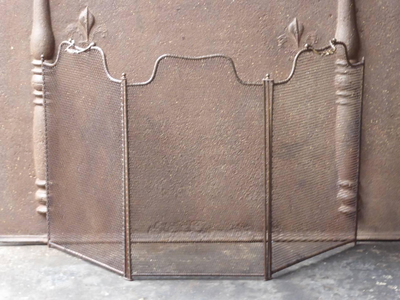 19th century French fireplace screen made of brass, iron and iron mesh.

We have a unique and specialized collection of antique and used fireplace accessories consisting of more than 1000 listings at 1stdibs. Amongst others, we always have 300+