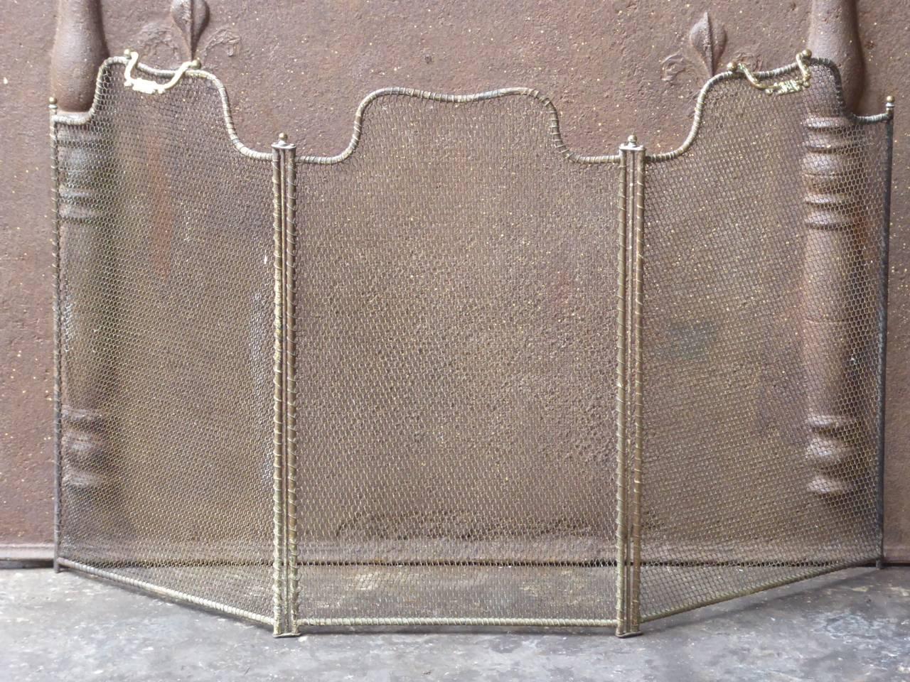 19th century French fireplace screen made of brass and iron.

We have a unique and specialized collection of antique and used fireplace accessories consisting of more than 1000 listings at 1stdibs. Amongst others we always have 300+ firebacks, 250+