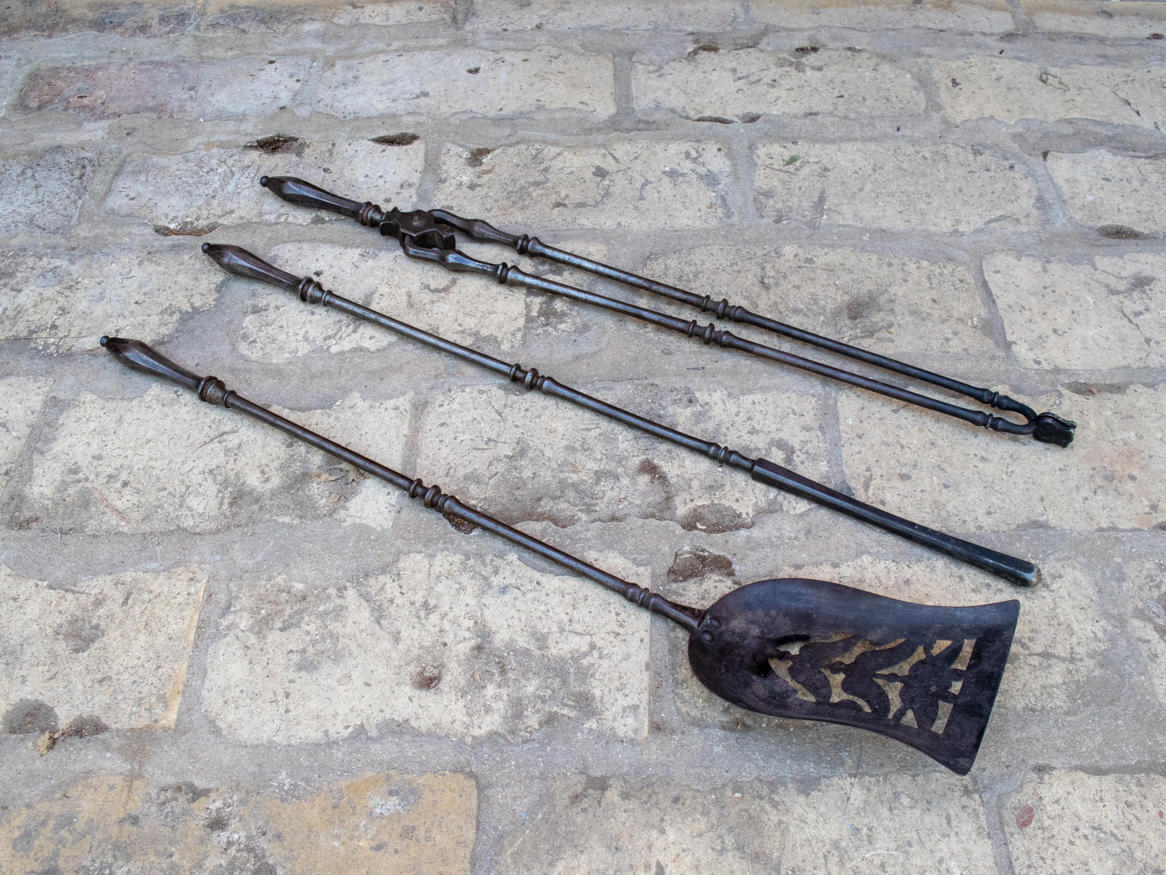 19th century French fireplace wrought iron tool set.