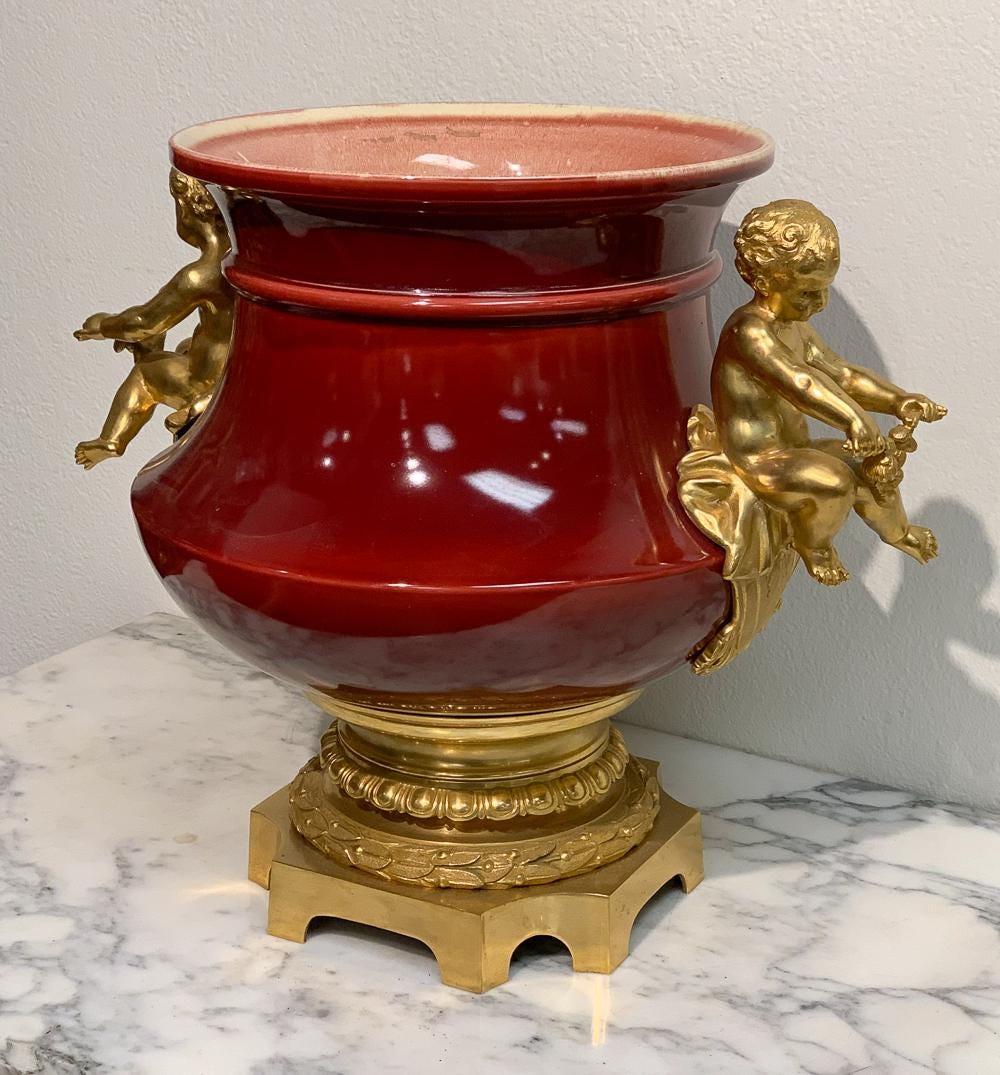 19th century French Flambe glazed and nicely cast gilt bronze mounts. Marked Luneville, see photos. Very good condition. Measures: 15 high x 17 wide and opening is 11 inches wide.