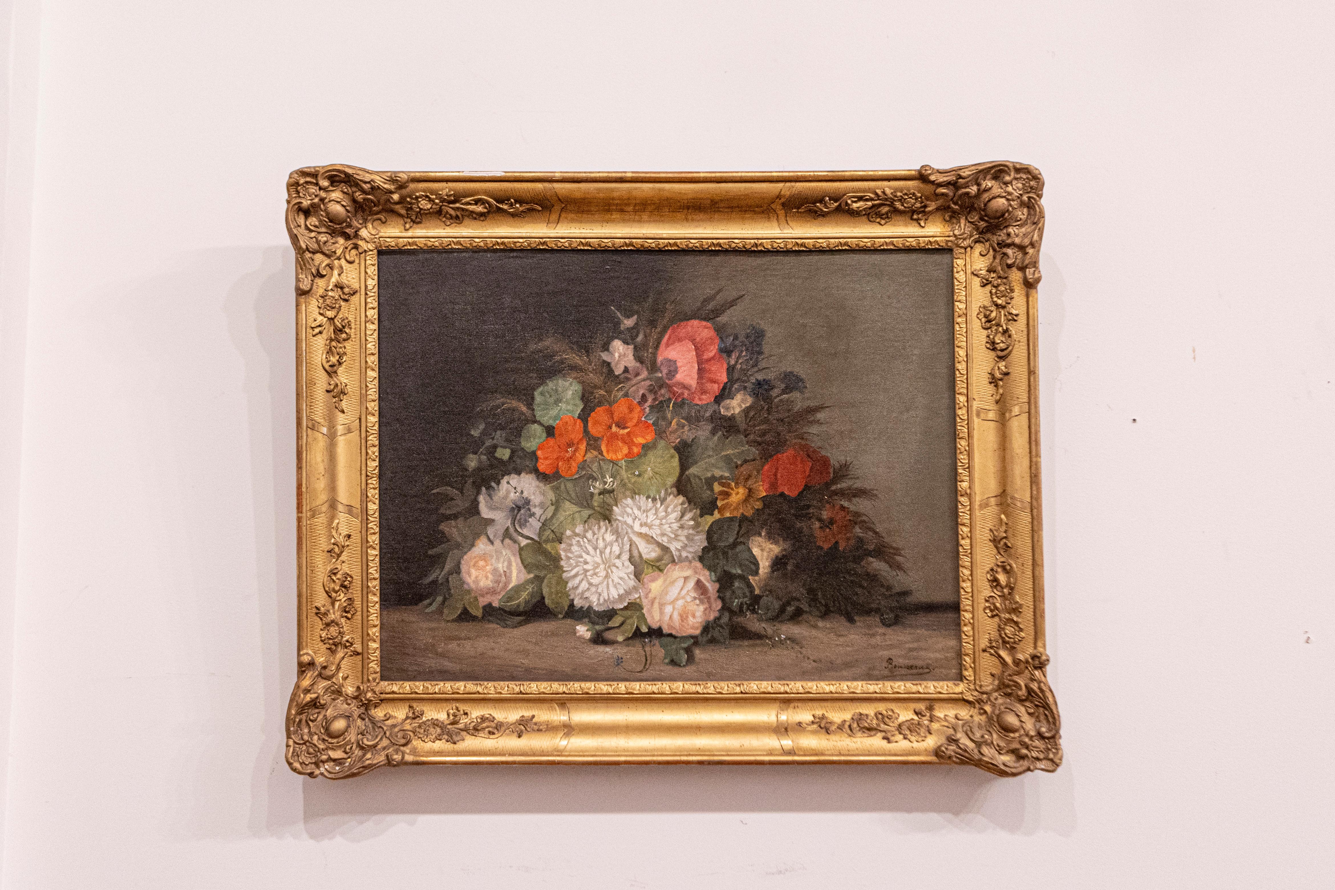 A 19th century framed oil on canvas floral painting signed by French artist Philippe Rousseau (1816-1887). This French still-life painting depicts an exquisite bouquet of flowers placed on a neutral background, in a manner resembling the production
