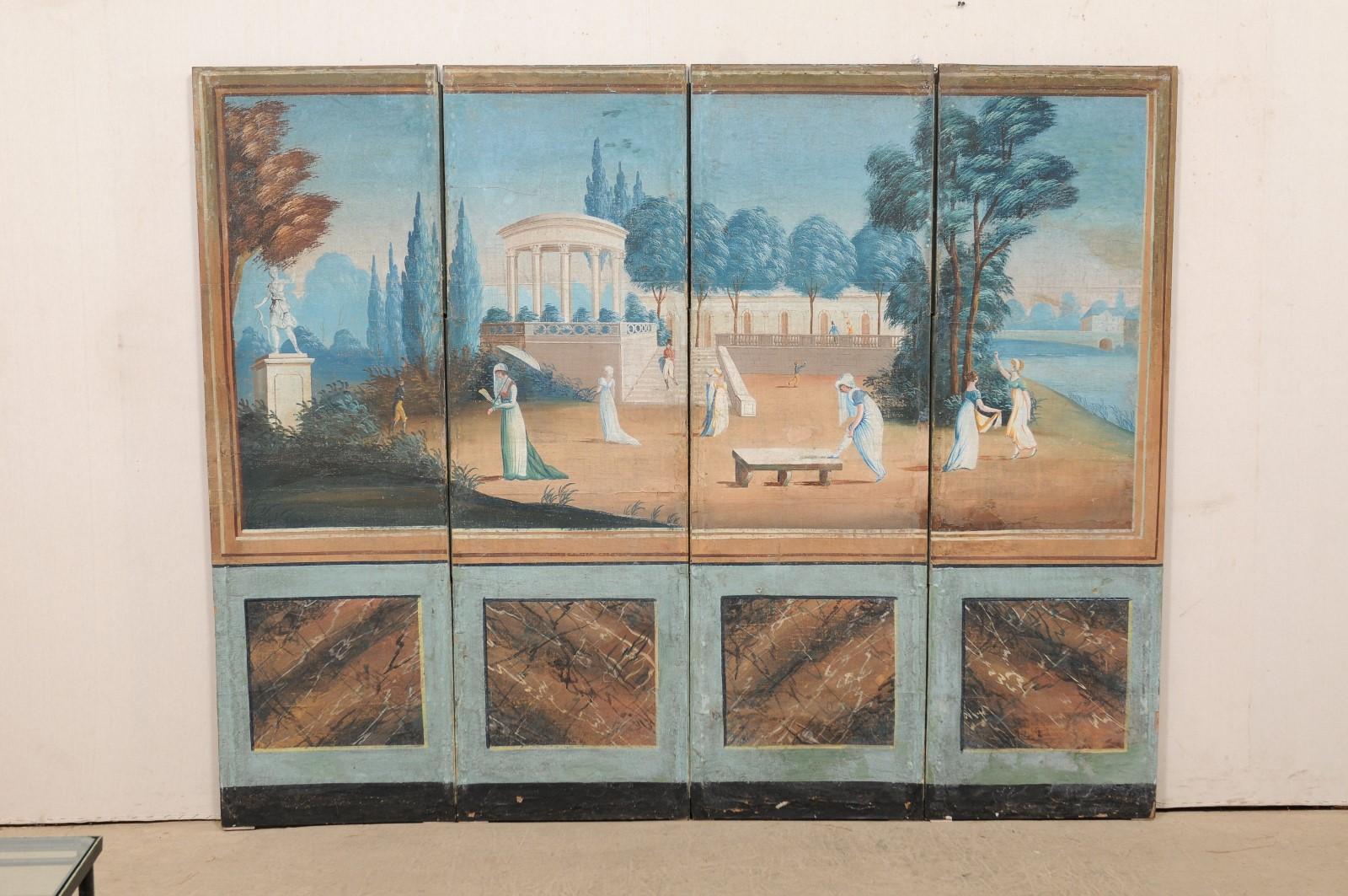 A French painted folding screen room divider from the 19th century. This antique accordion style folding screen from France features four tall rectangular panels, each approximately 5.75 feet in height, whose front sides are adorned with paper