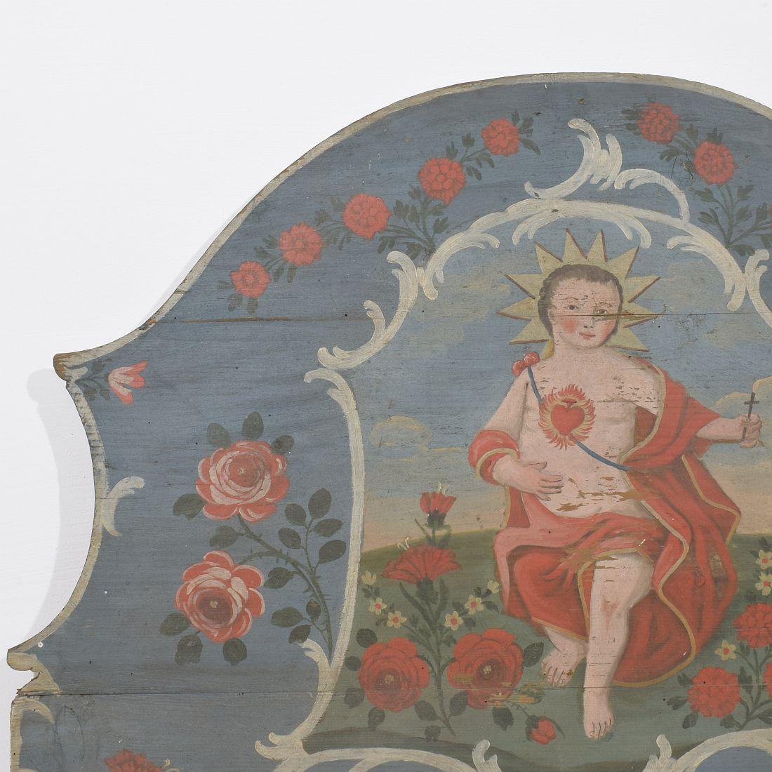 Français Panneau en bois peint d'art populaire français du 19e siècle avec un bébé Christ en vente