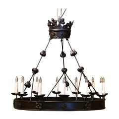 Antique 19th Century French Forged Black Iron Twelve-Light Round Chandelier