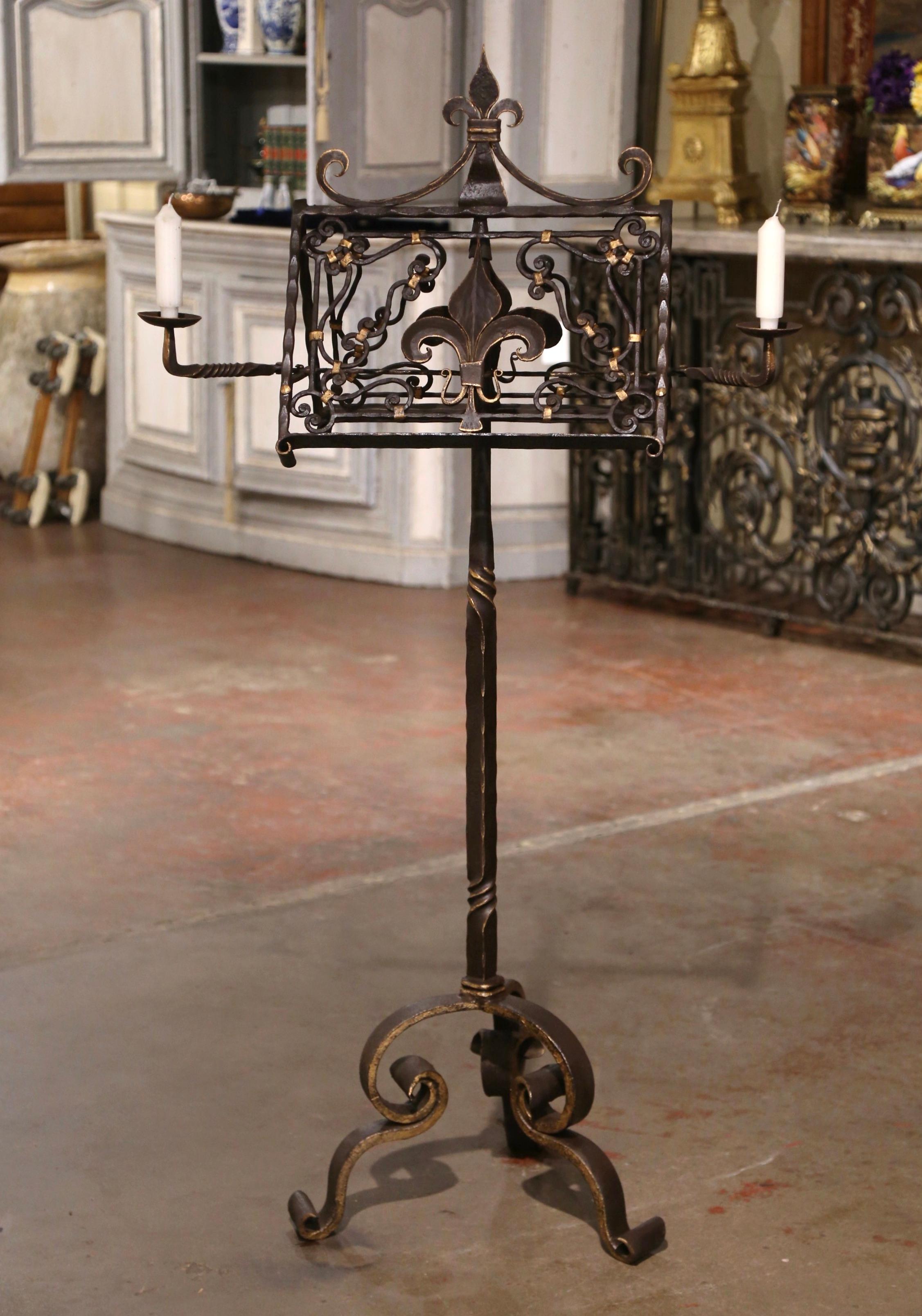 Place your Bible or music book on this antique, double-sided slanted page rest. Crafted in France, circa 1890 and standing on a tripartite base with three curved legs over a spiral twist central stem, the Gothic 