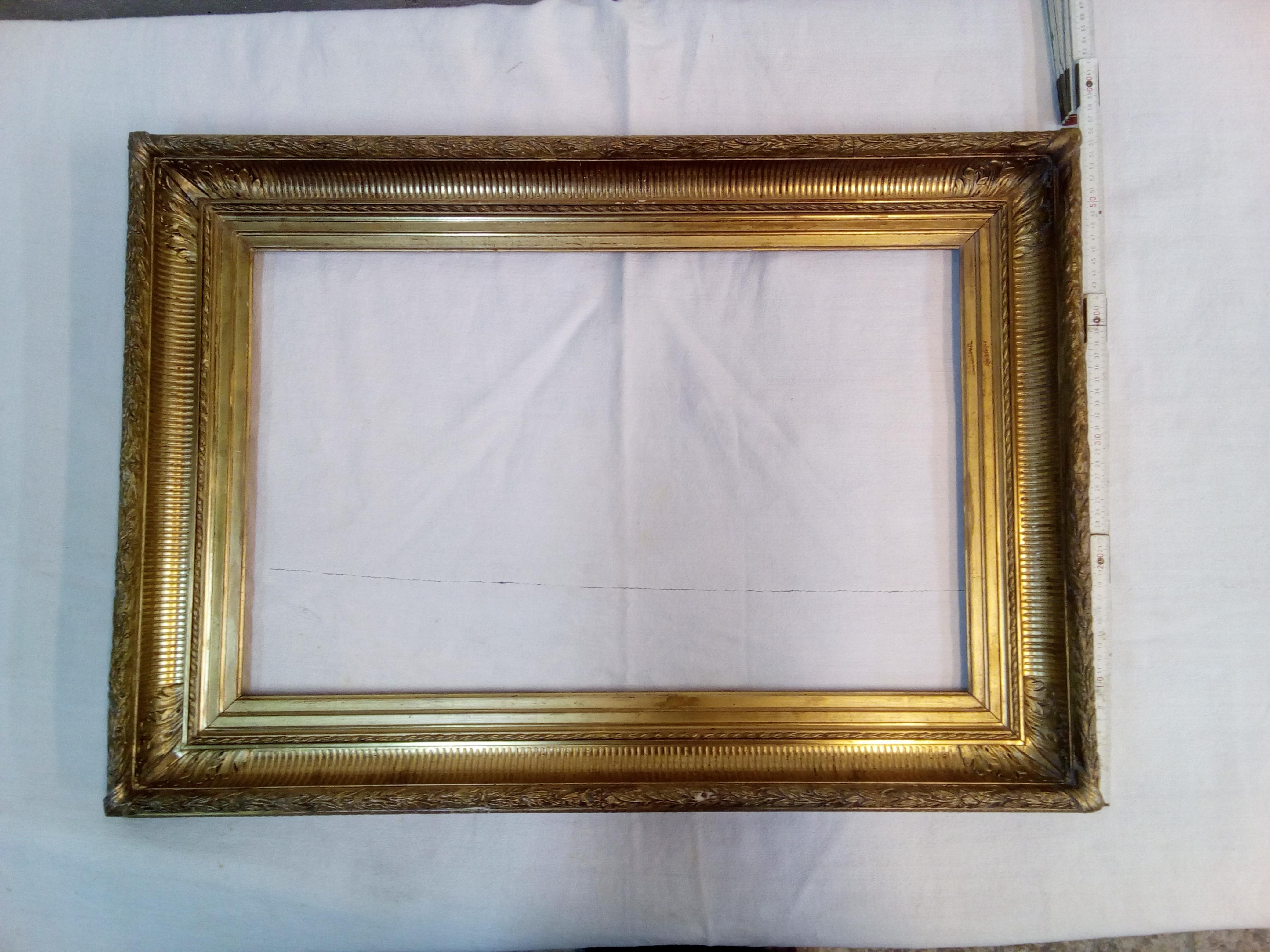 Wood 19th century Empire style frame hand carved gilded with pure gold leaf For Sale