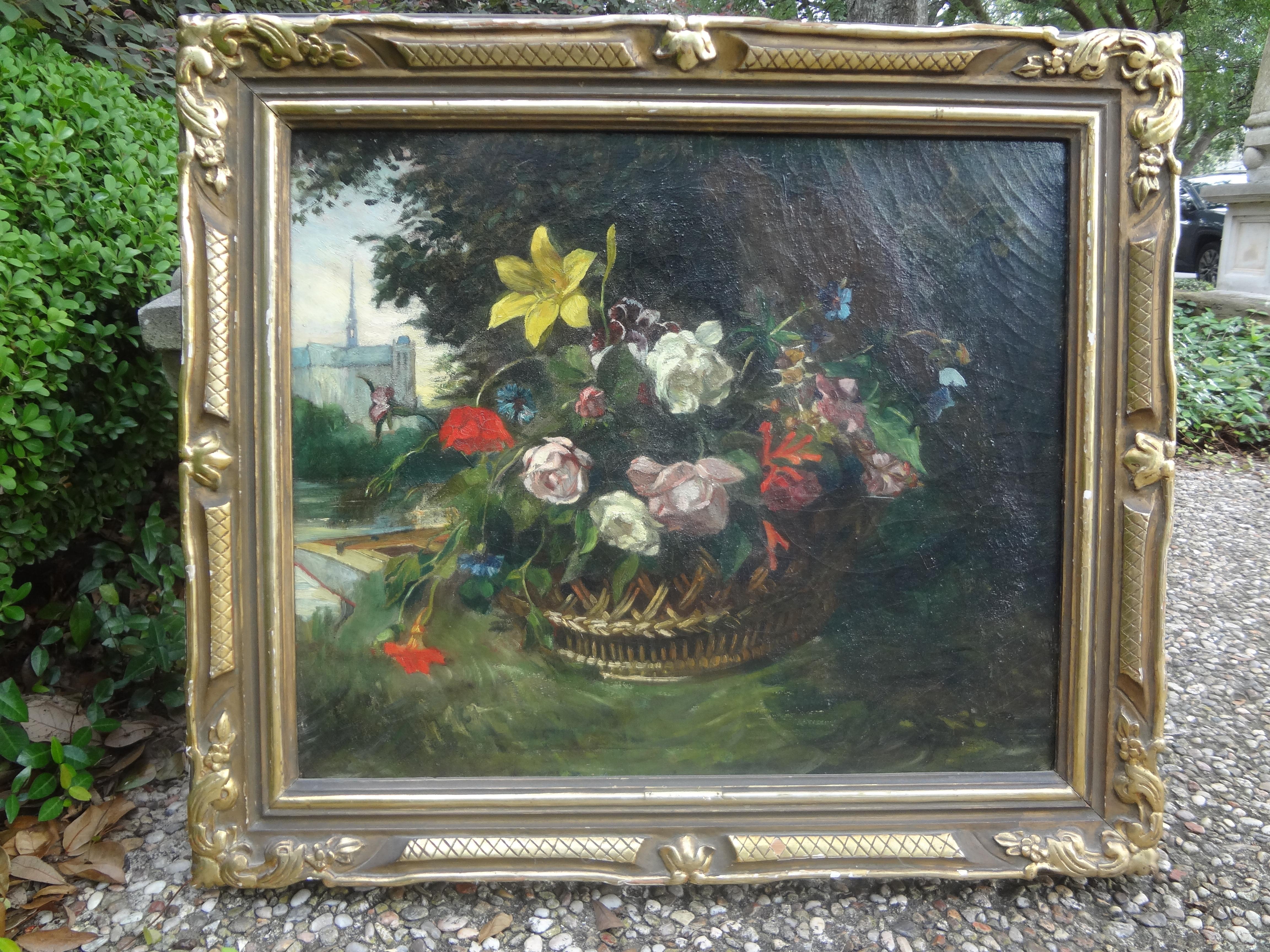 19th century French framed floral oil painting.
Stunning 19th century French framed oil on canvas painting. This gorgeous well executed Barbizon School oil painting depicts a basket placed outdoors with a lovely selection of seasonal flowers in a