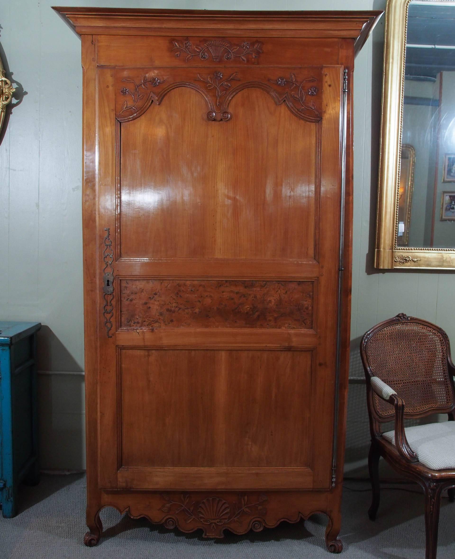 Antique French carved fruitwood bonnetierre.