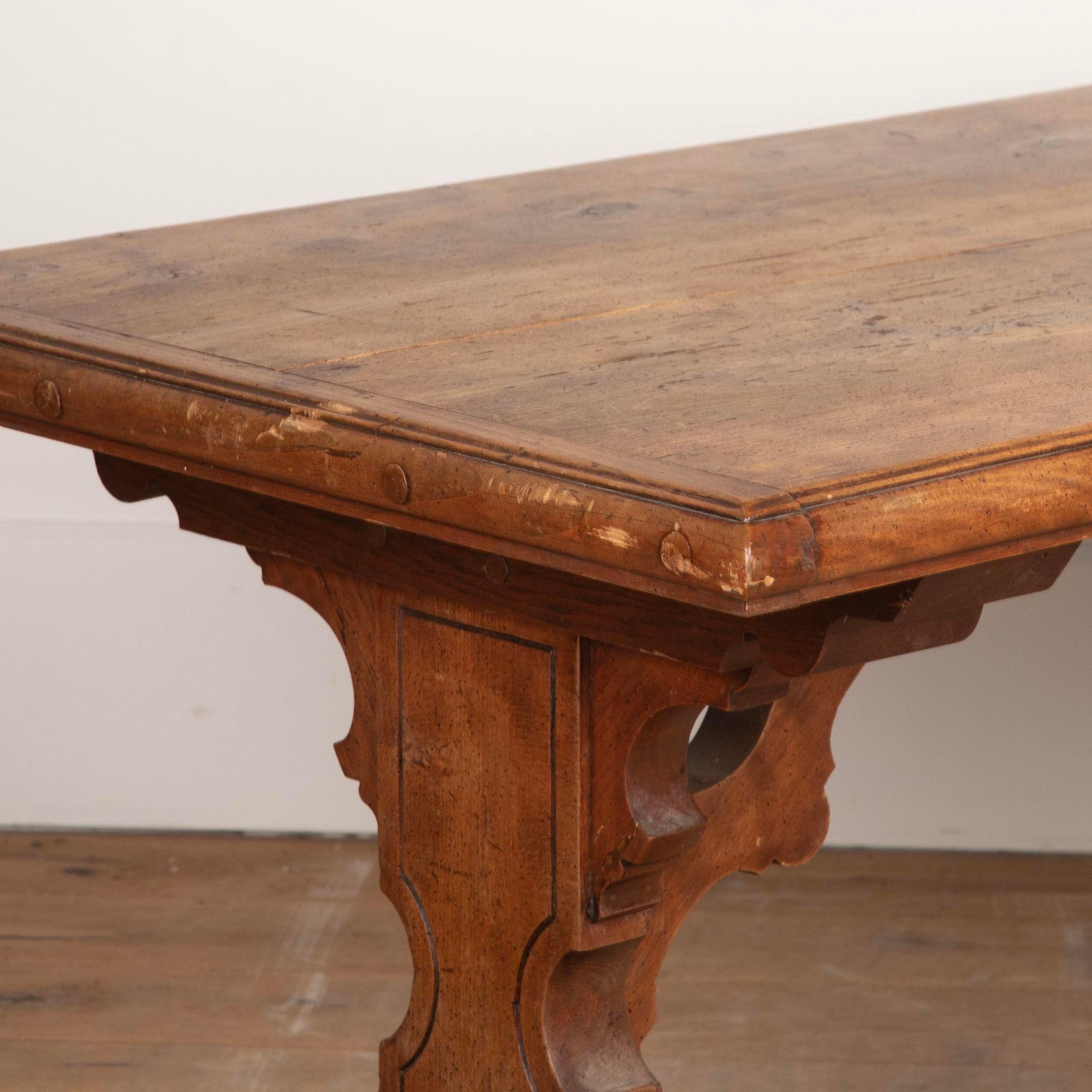 19th century French fruitwood trestle table.
Dating to circa 1800, this table features two drawers and some signs of age related wear.