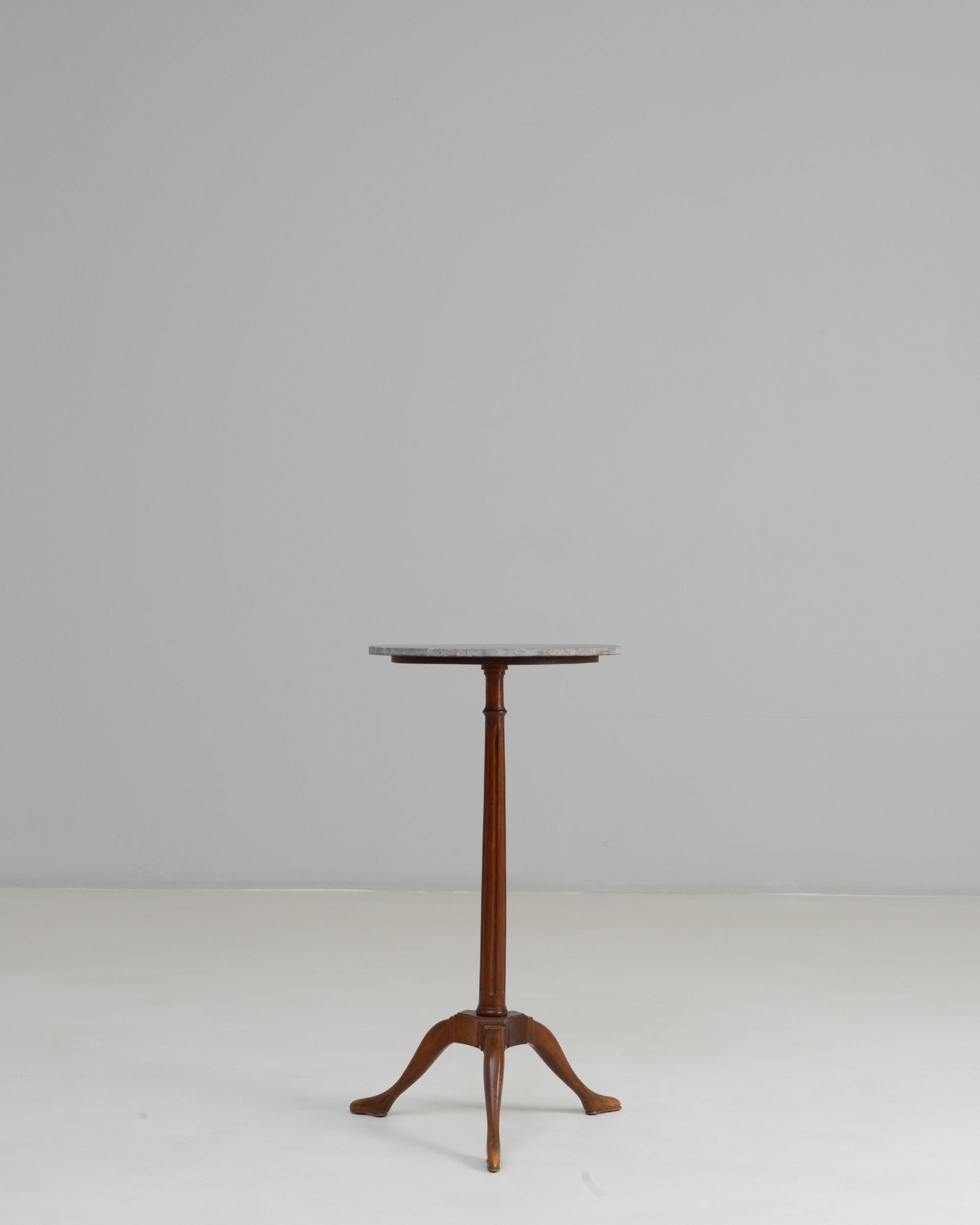 19th Century French Georgian Tripod Side Table With Marble Top. This elegant side table blends French craftsmanship with the balanced, refined lines associated with Georgian influence. Its round marble top offers a cool, polished surface that