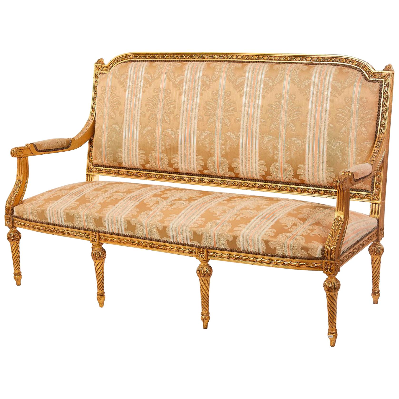 Canapé français du 19ème siècle en bois doré de style Louis XVI en vente
