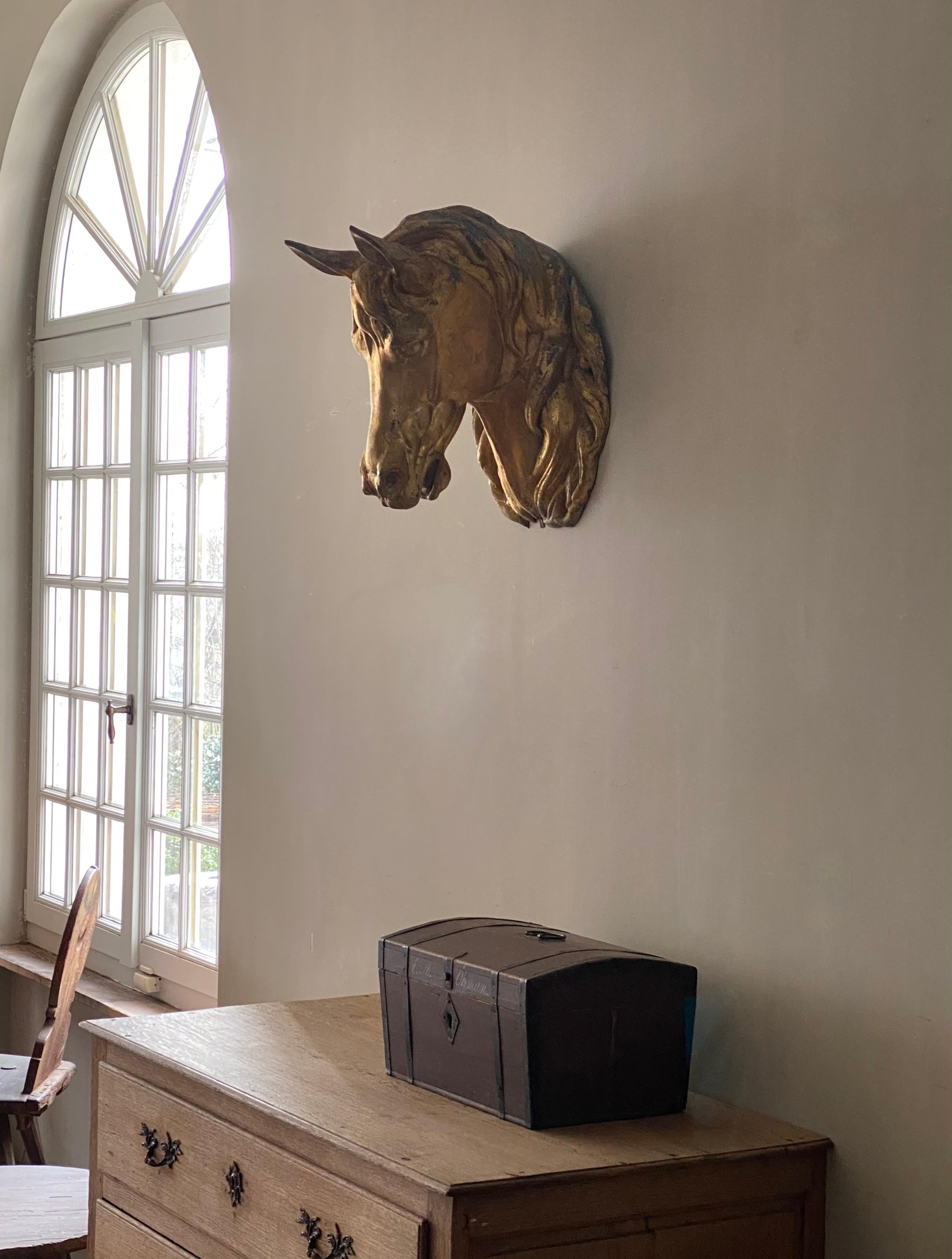 19th century gilded zinc horse head.
These were used as a butcher's mark and often hung above the door.
Beautiful original French piece, period 1870, with the original gilding.
The weathering of it gives it a lot of character. Often the gilding is