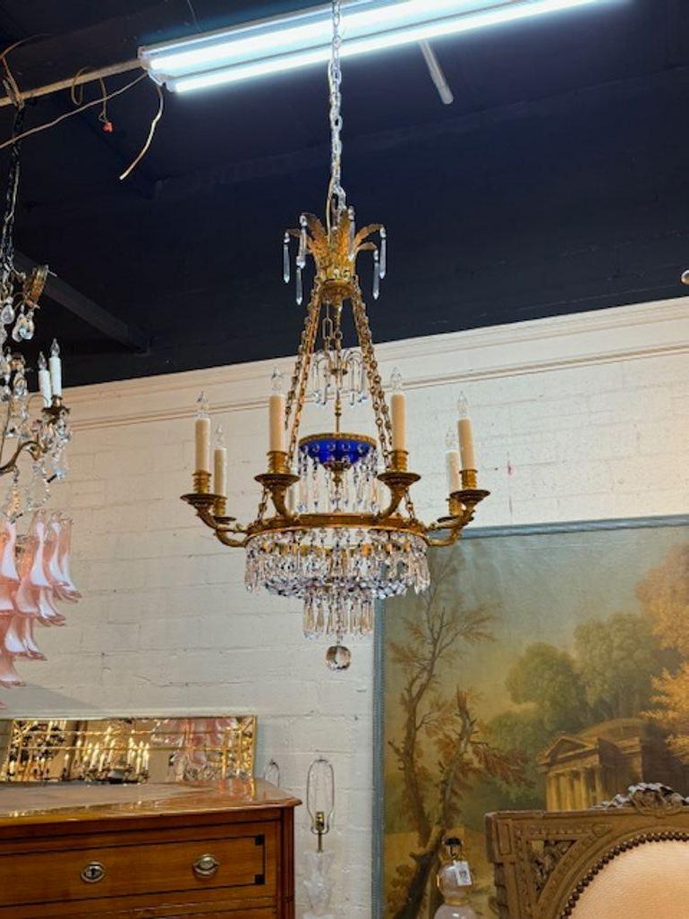 Gorgeous 19th century French Louis XVI crystal and gilt bronze chandelier with cobalt blue glass. Adds a real touch of elegance! Circa 1880
38h x 24w