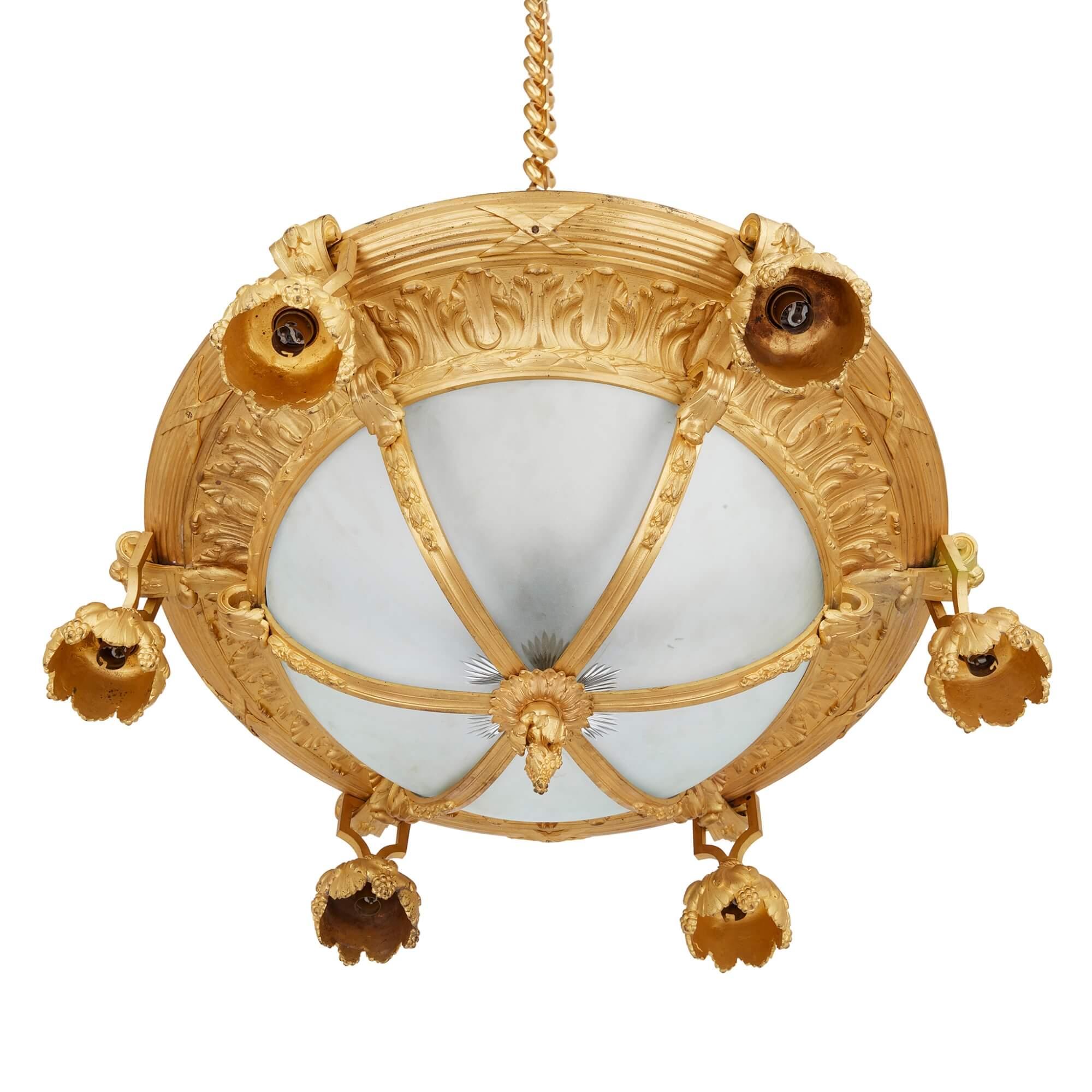 19th century French gilt bronze and glass six-light chandelier 
French, Late 19th Century 
Height 30cm, diameter 72cm

This very elegant late 19th century French six-light chandelier is crafted from frosted glass and gilt bronze and is of an unusual