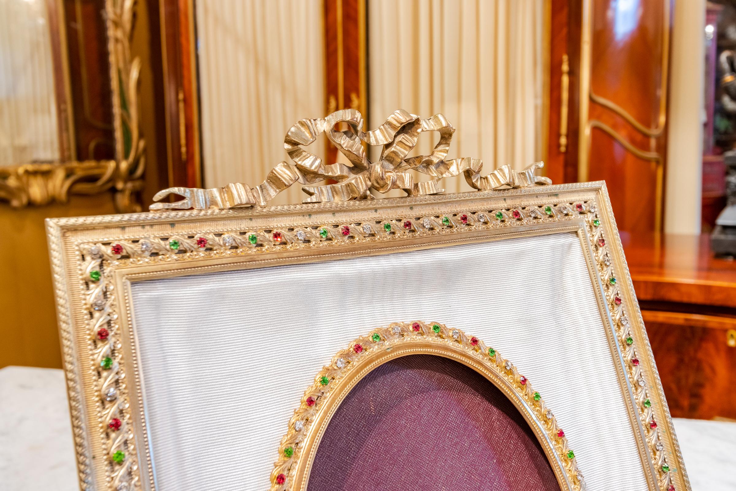 A fine 19th century French Louis XVI gilt bronze and jeweled frame.