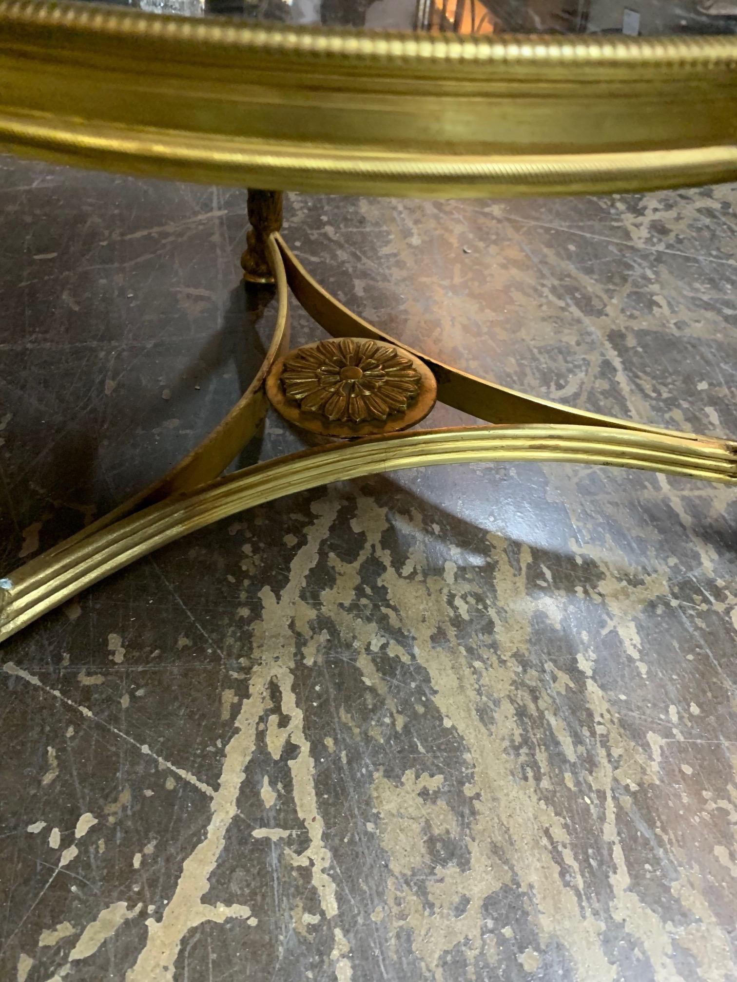 Very fine 19th century French gilt bronze and marble gueridon table. Exceptional details on the brass including ram's heads on the corners. Gorgeous marble as well! A truly elegant piece!