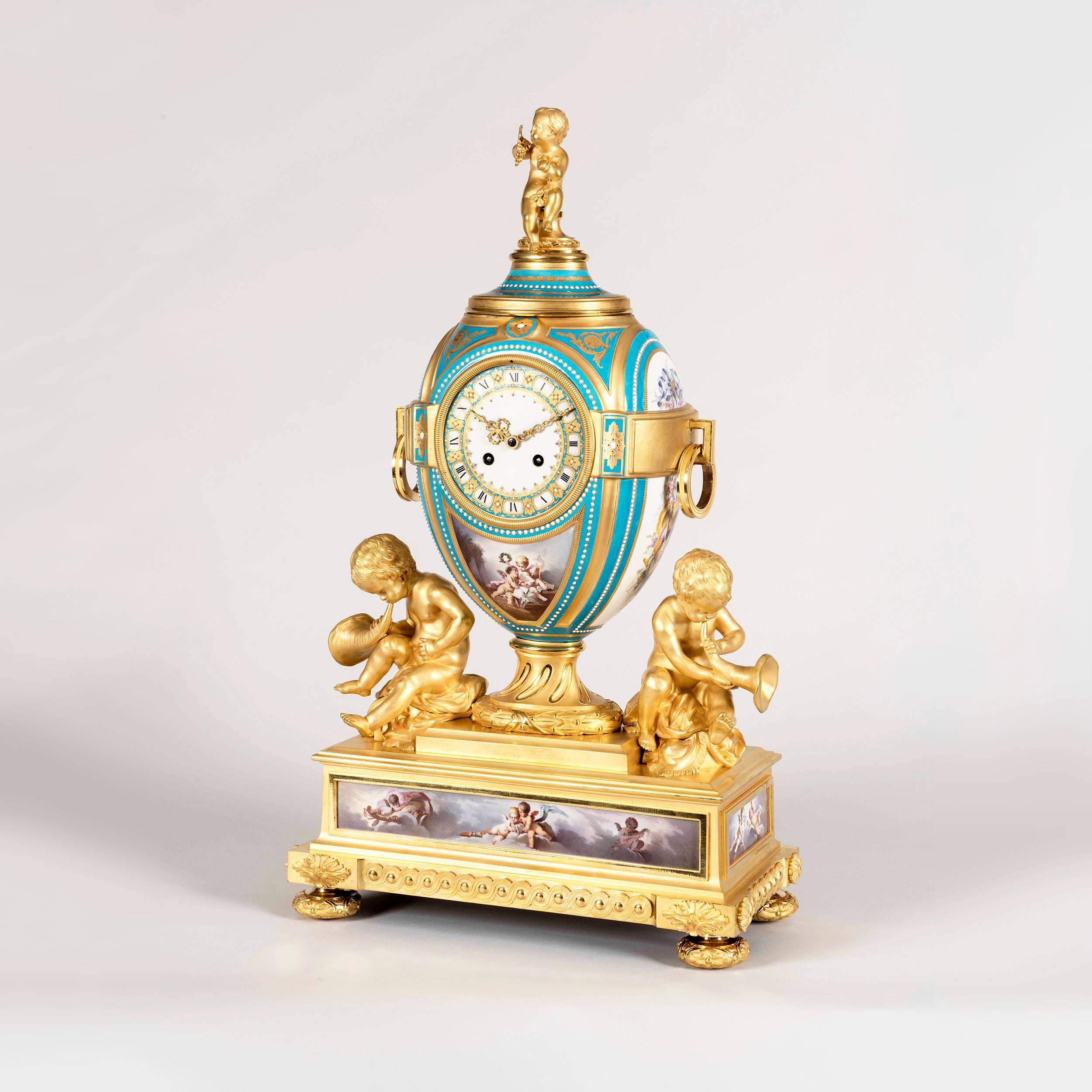 An important Garniture de Cheminée in the manner of Henry Dasson

Constructed in well cast and chased gilt bronze, with 'Sevres' type 'jewelled' gilded porcelain with a Bleu Céleste field, hand painted with polychromes, and comprising a mantle