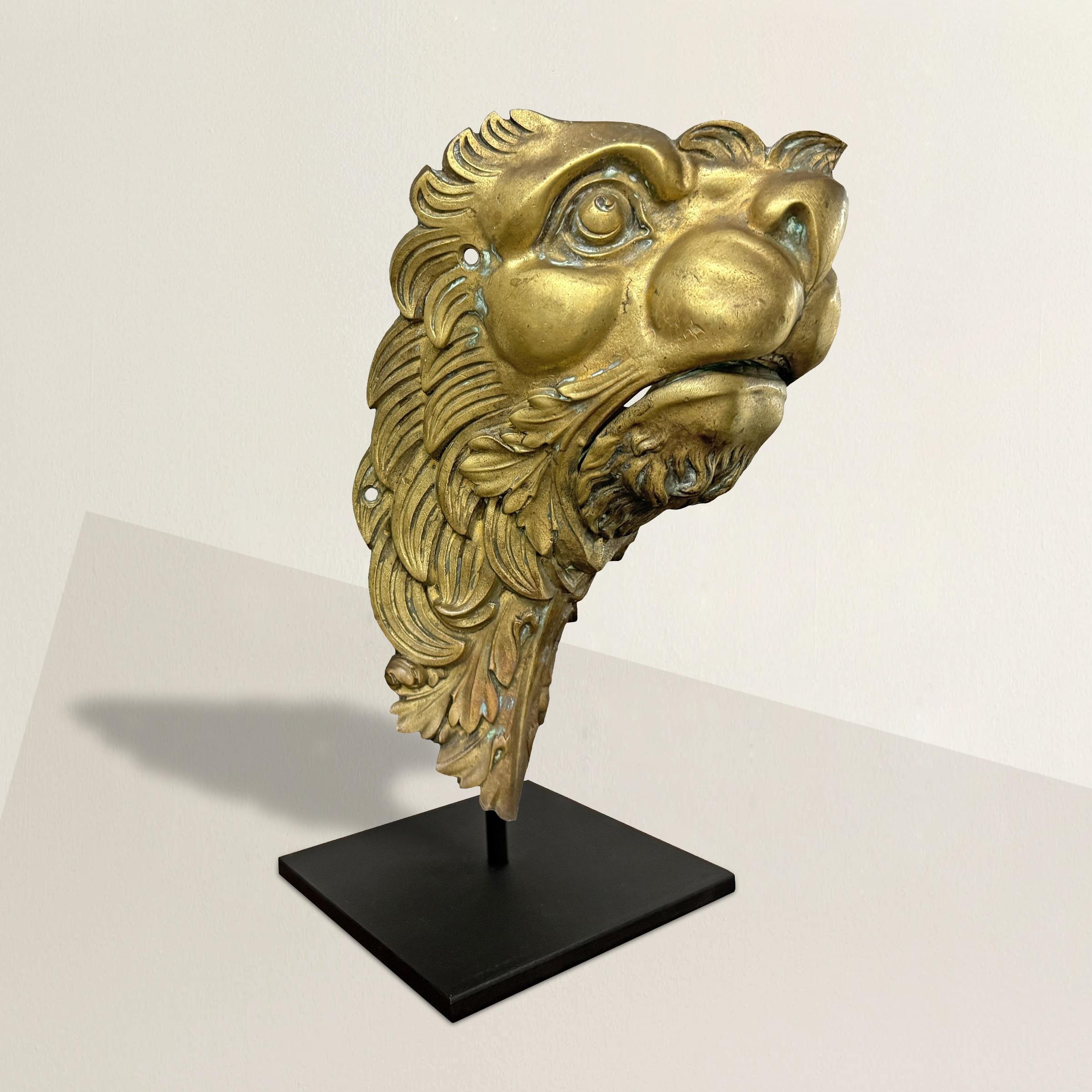 This 19th-century French gilt bronze billiard table ball return is a masterpiece of craftsmanship, expertly cast in the form of a majestic lion. Its intricate details capture the lion's regal presence, with its mouth cleverly designed to open and