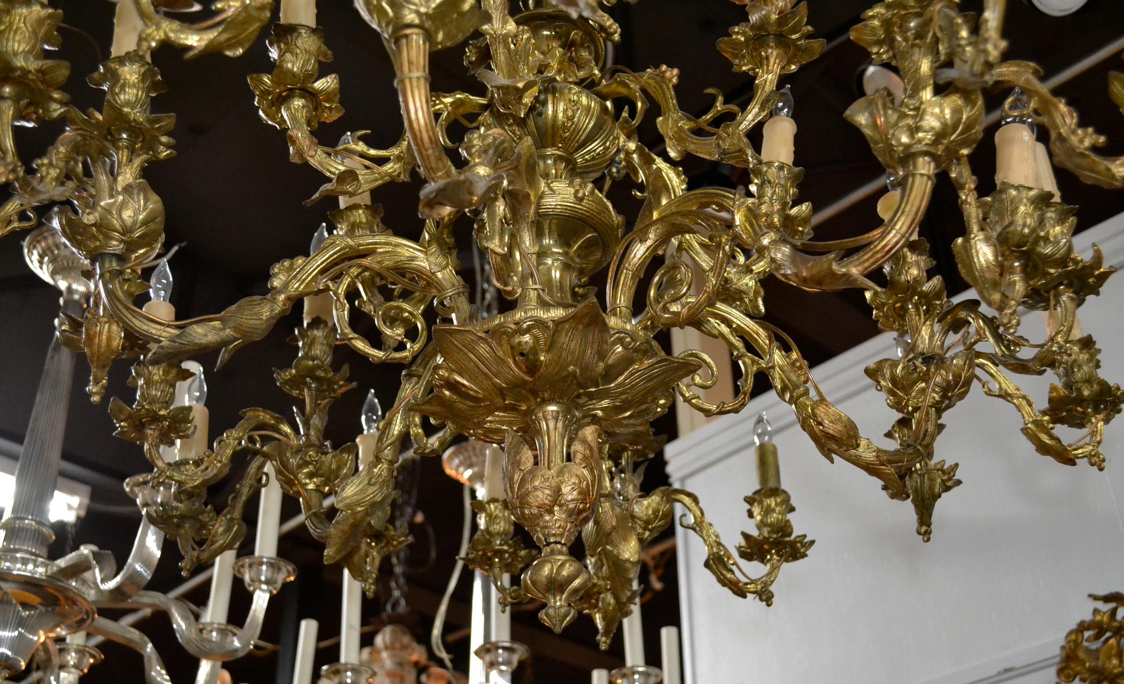 Fine 19th century French gilt bronze chandelier with 30-lights. In acanthus leaf and foliate form with gracefully curved arms and a beautiful, aged gilt patina.