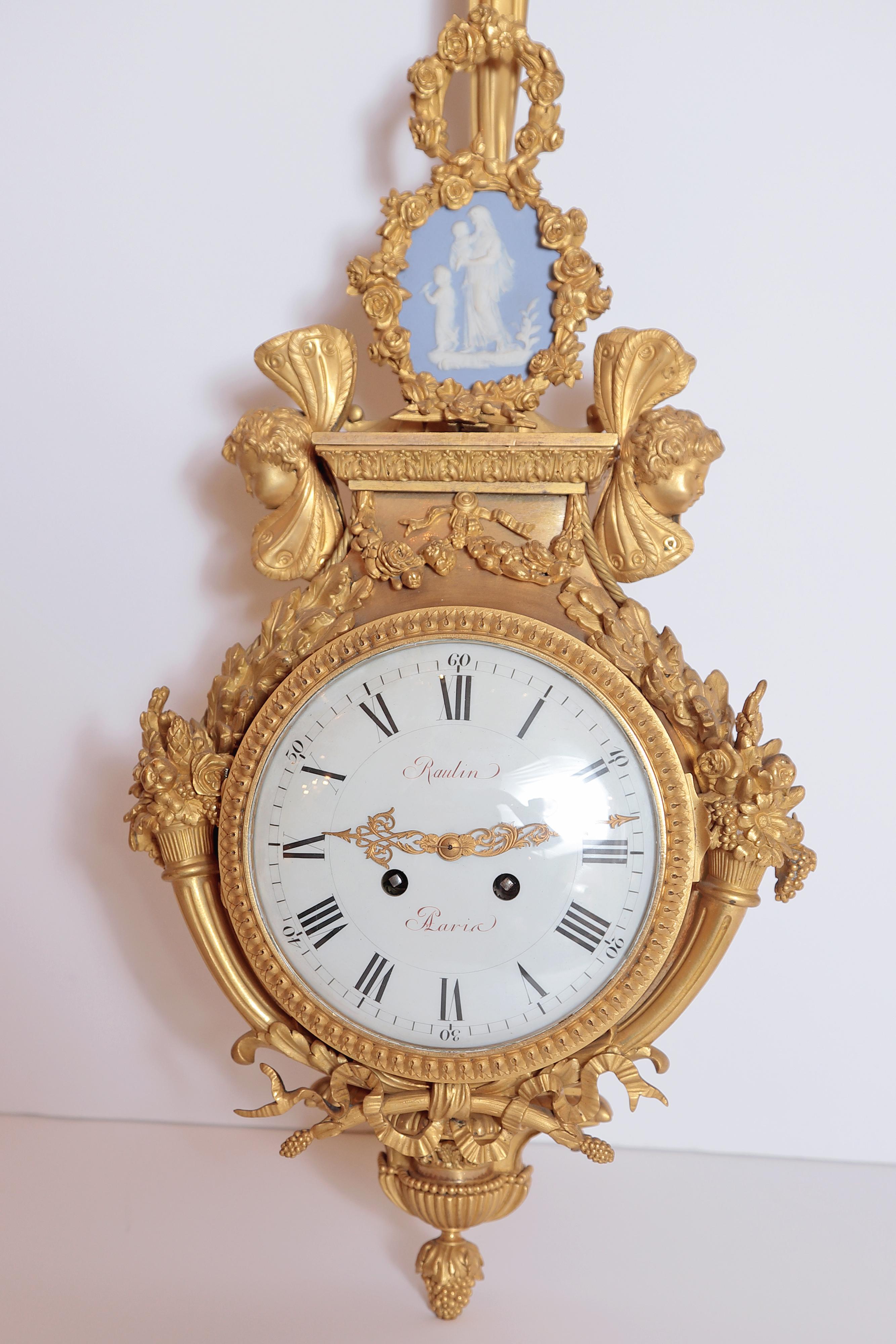Finest 19th century French gilt bronze and Wedgewood plaques clock and barometer signed Victor Raulin. Fine gilt bronze winged female heads and light blue jasper plaques.