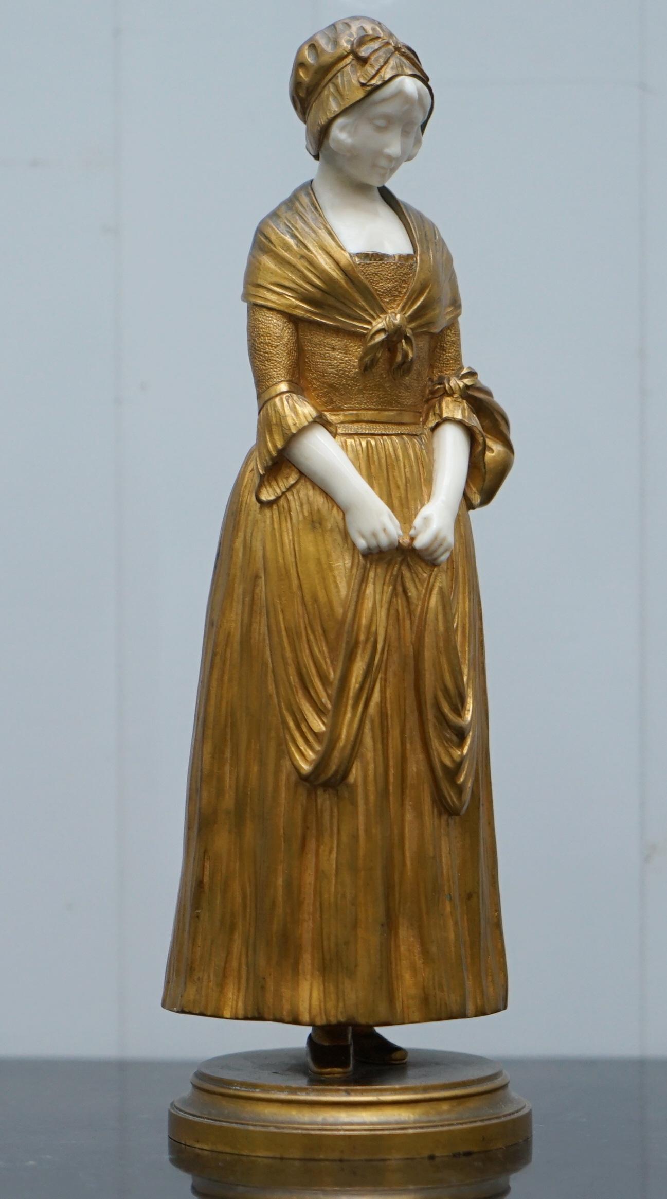 We are delighted to offer for sale this stunning very rare and highly collectable Dominique Alonzo gilt bronze statue of a young girl titled “La Vuelta Del Mercado” which roughly translates to the “The Return To The Market”

I have two of these