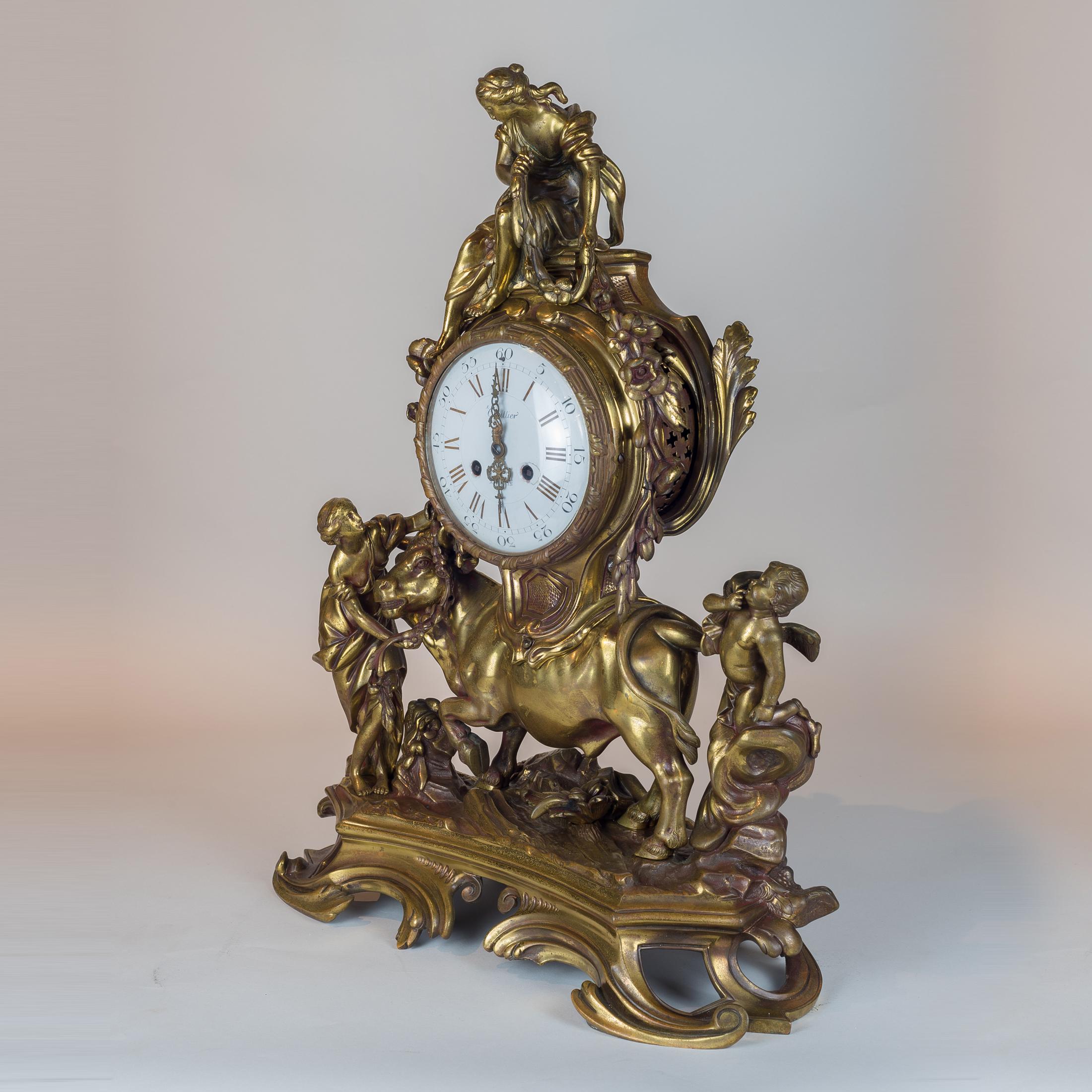 A fine french gilt bronze figural mantel clock. Surmounted on a plinth base with scrolling acanthus detail.

Origin: French
Date: 19th century
Dimension: 22 in x 17 1/2 in.