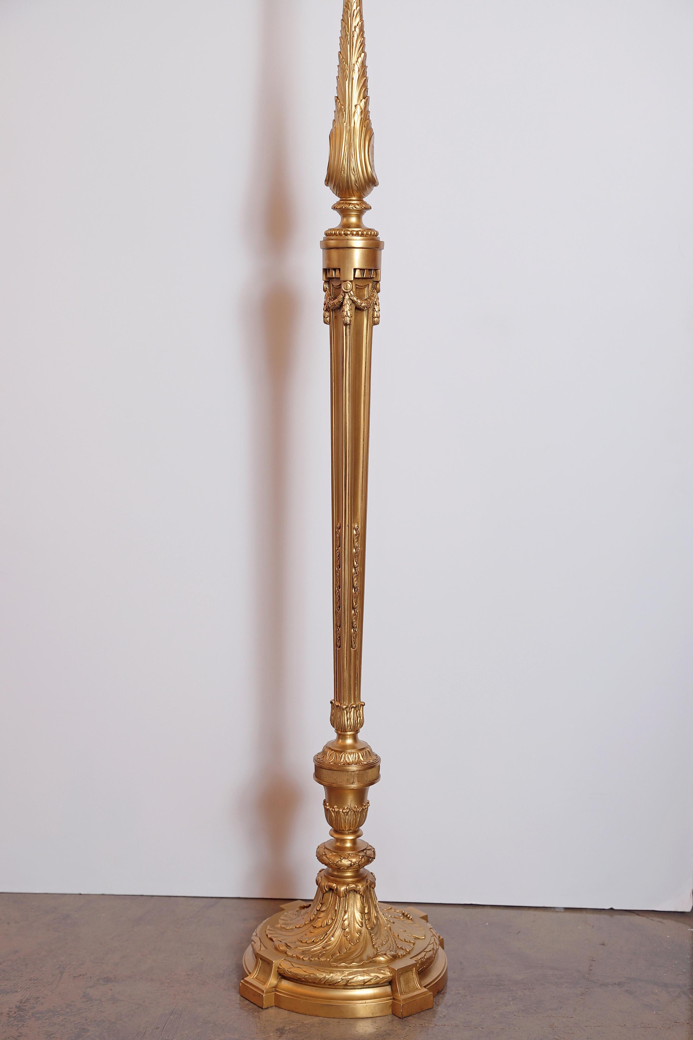 19th century French finely detailed Louis XVI gilt bronze floor lamp. Great quality custom wired and shaded.