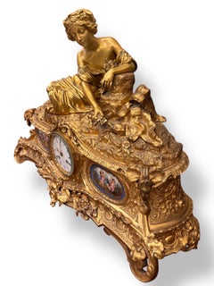 19th Century French Gilt Bronze Mantel Clock with Enamel Panels