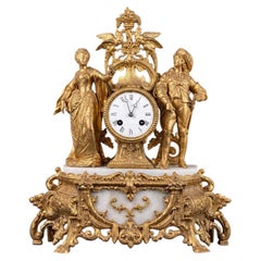 Französische Kaminsimsuhr aus vergoldeter Bronze des 19. Jahrhunderts mit Figurenpaar und Marmorsockel
