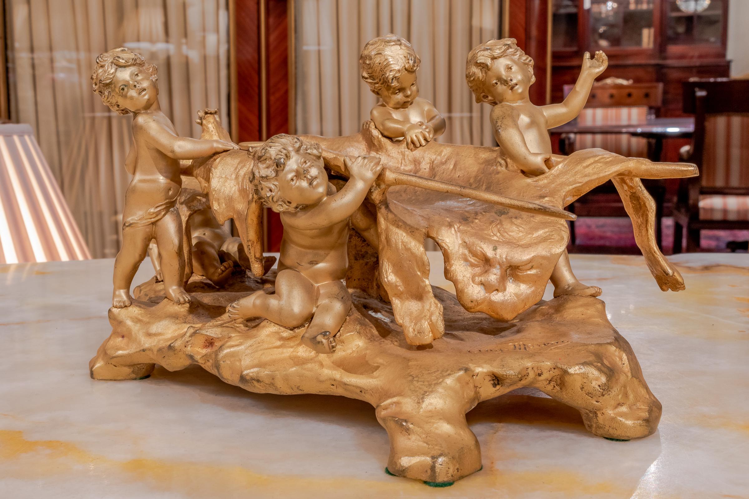 19th century French gilt bronze by August Moreau of a group of cherubs with their kill after the hunt.