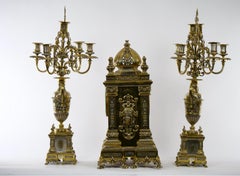 19th Century French Gilt Bronze & Silvered Three Piece Clock Garniture