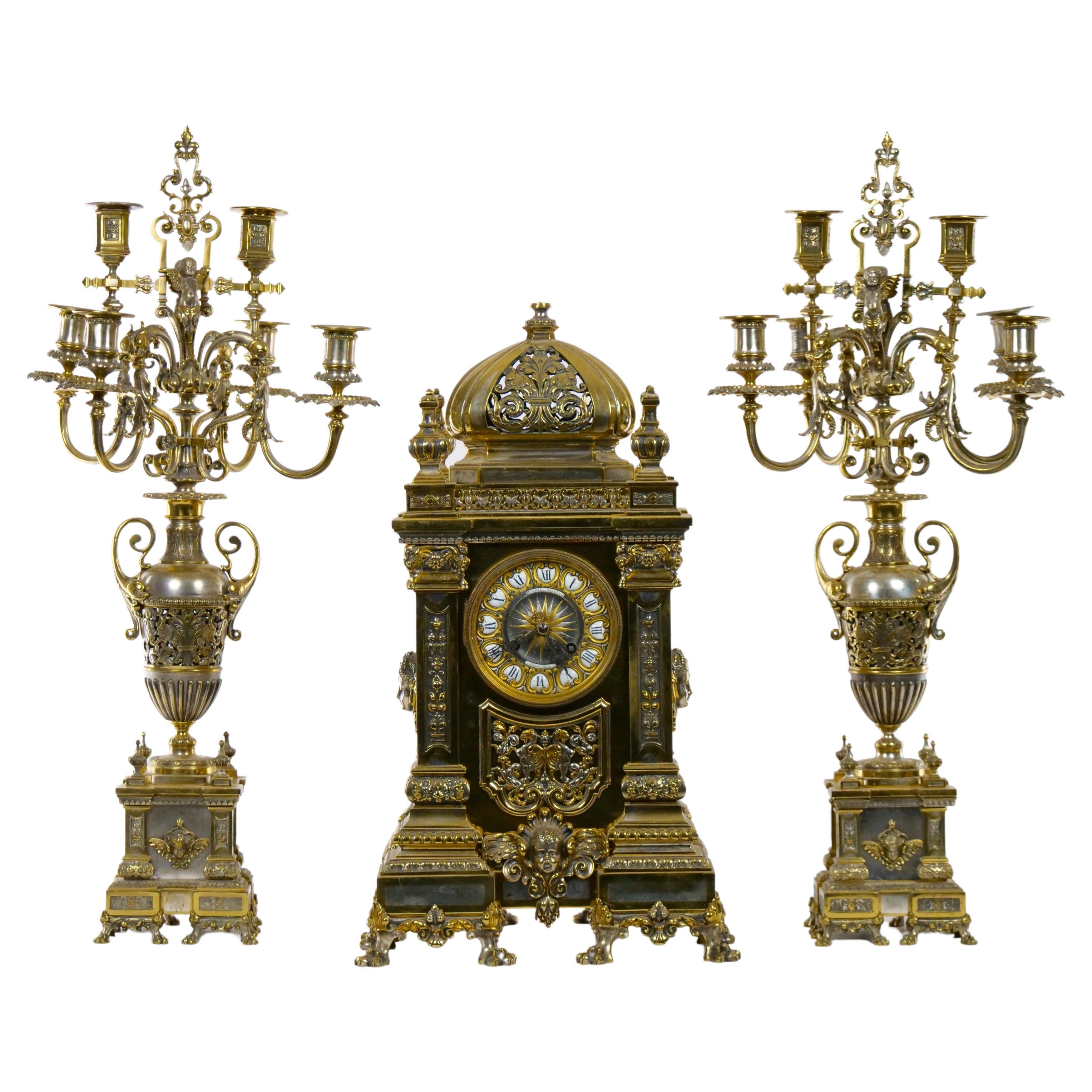 19th Century French Gilt Bronze & Silvered Three Piece Clock Garniture For Sale