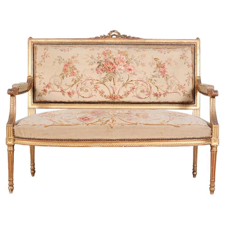French Louis XVI Style Carved Wing Back Settee by Lewis Mittman Inc at