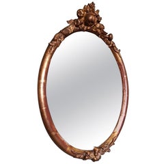 Antique 19th Century French Gilt Oval Shaped Mirror with Fruit Ornaments