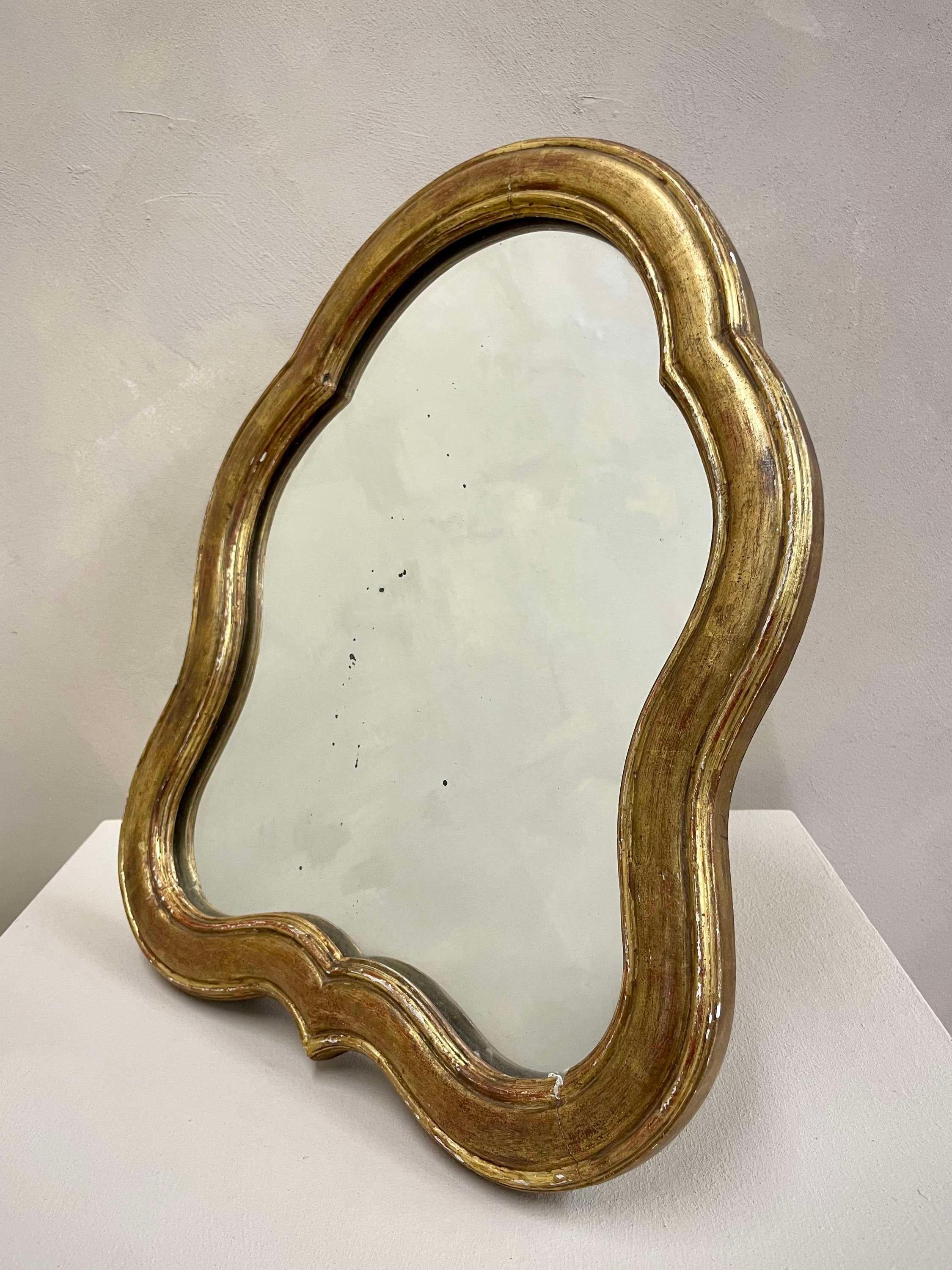 French c1900 gilt table top mirror.
This can be also hung and has a great enclosed stand that can be pushed in if required 
Original plate.

Dimensions:W: 36cm (14.2