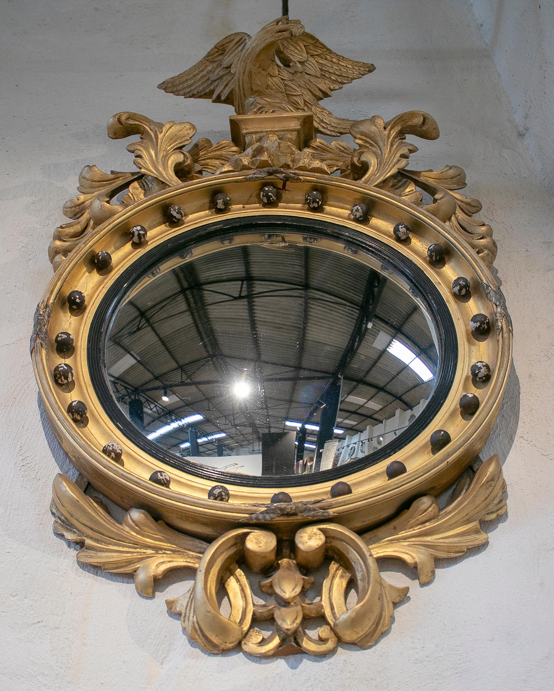 Wood 19th Century French Giltwood Framed Convex Mirror Crowned with Eagle For Sale