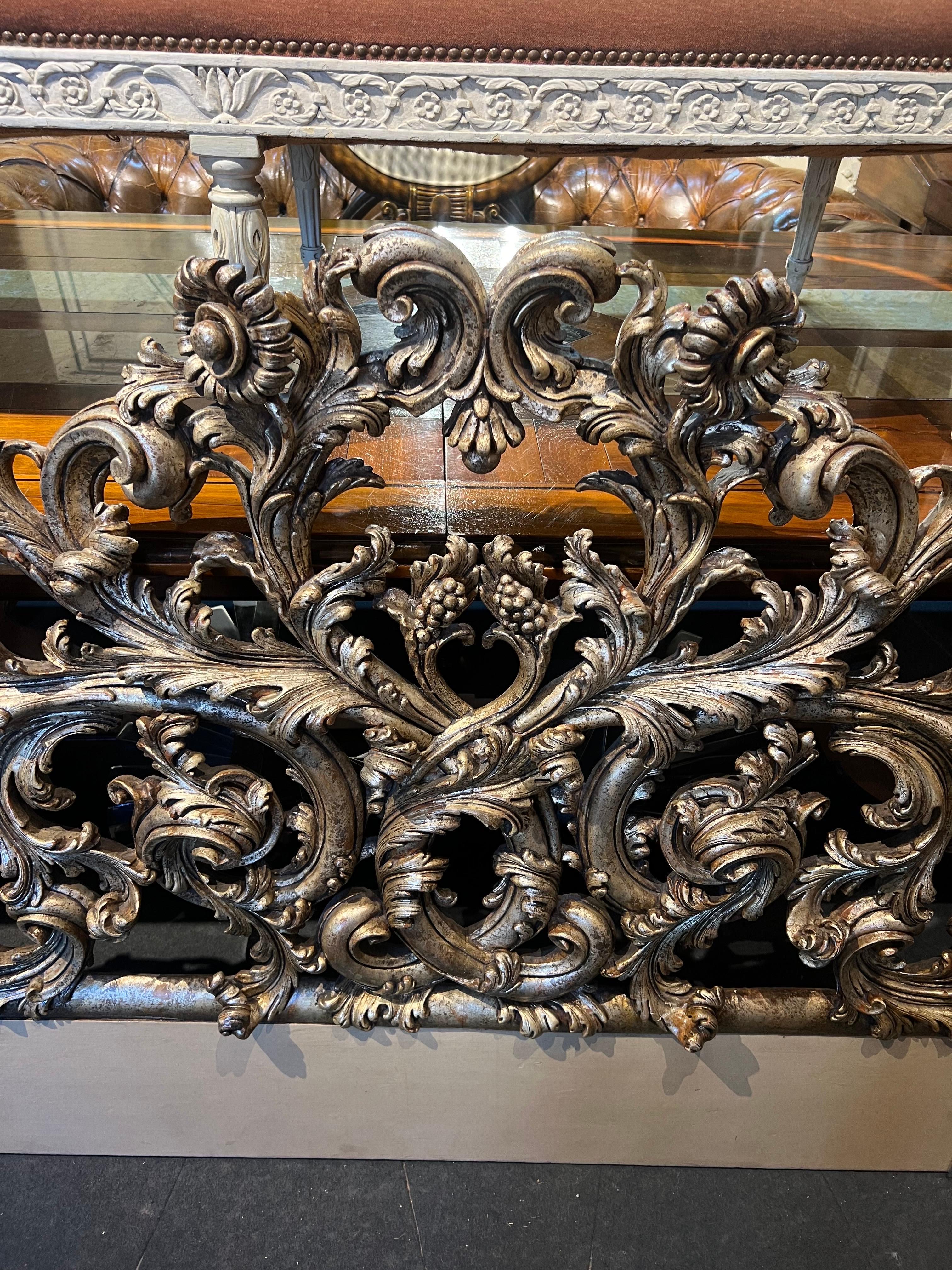 19th Century French gilt wood hand carved headboard in Rococo style in original condition. Very stable one with astonishing details and great proportions.
France, circa 1880